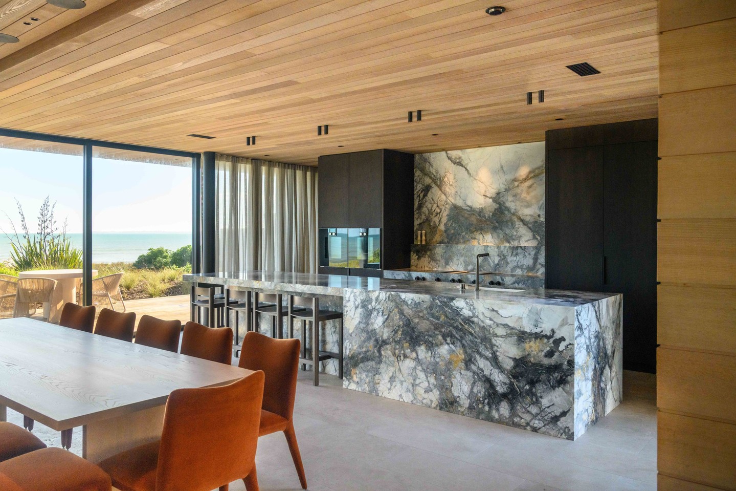 A kitchen designed to hold its own against the Pacific.
At the heart of this recently completed Papamoa beachfront sanctuary sits a striking central island wrapped in Invisible Grey marble, hand-selected by our clients and imported from Italy. Its bold veining brings movement and drama — a quiet nod to the ocean just beyond the glass.
European White Oak Toitū veneer cabinetry, finished in a custom stain, grounds the space with warmth, while Western Red Cedar lines the ceilings — carefully detailed to align seamlessly with the exterior cladding profile. It’s these considered moments that elevate a home from beautiful to exceptional.
Set above the dunes, every elevation of this sanctuary has been designed to frame uninterrupted ocean views, creating a home that feels both sheltered and open to the horizon.
Builder: @calleyhomes
Architecture: @carnachan_architecture
Interiors: @shawdesign.nz
Kitchens & Cabinetry: @vekartnz
#CalleyHomes #BeachfrontLiving #Papamoa #LuxuryHomes #ArchitecturalDetail #BuiltToPerform