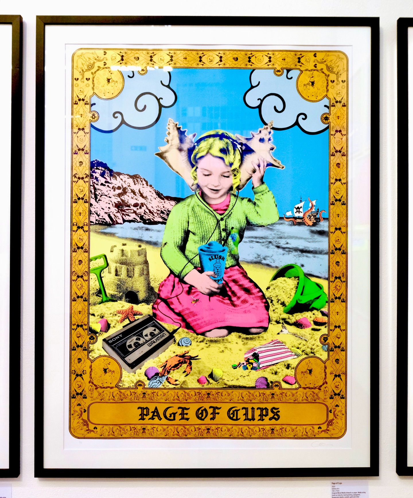 We wanted to add some new pieces to our Tarot card series to be part of our latest show, and the Page of Cups felt like the perfect choice! 🙌 This card is associated with creativity, emotion, intuition, and the youthful curiosity and the openness of childhood, which really resonates with the ideas we explore in this latest show.
✨🩵🐚🦀🌊🎧🍬🪣⛱️🐟🐙🎶☀️🩵
The imagery of this card depicts a youthful messenger of creativity and intuition, someone guided more by wonder and play than by logic! Here we have depicted the Page as Abigail when she was a little girl and, similar to the traditional card, she sits by the sea, referencing memories of our childhood seaside holidays that have stayed with us long after we have grown up.
The suit of Cups relates to the emotional world of dreams, love and imagination. So in our Page of Cups the Page is absorbed in a dreamlike moment, indulging in creativity and play. She’s listening to music through a Walkman with shell headphones, a nod to the way children try to hear the sea through a seashell! We chose a nostalgic Slush Puppie cup to depict the ‘Cup’, and also kept true to the traditional symbolism of the card by including a fish within the imagery, though here it appears as an unsettling fish bone buried in the sand!
Typical of our Tarot series, there is a strange darker edge running through the scene, with other unnerving elements hidden within the imagery: a trail of ants eating the pick ’n mix spilled onto the sand, skulls lurking within the cliff face, a wasps waiting to sting, a crab, and a pirate ship in the distance being attacked by a kraken!
‘Page of Cups’
2025
Edition of 6
102 x 72cm
Original Mixed Media Artwork on paper:
Made using hand-cut stencils, hand-painting, spraypaint, fluorescent details, metallic gold and silver hand-painting and hand-pullled Silkscreen print.
Although part of a limited edition of 6, each piece is handled individually and each is therefore unique by their very nature!
Message us to check availability! ✉️
#pageofcups #tarotart #seaside #picknmix #thecamerontwins