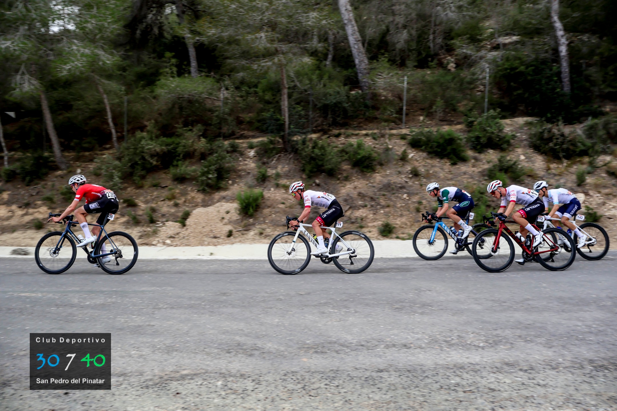 Congratulations to @heronlandgillis who kicked off his 2026 season in February with @ignitejuniorcycling in Spain! What an amazing team and program for him to have the opportunity to be a part of. These pics are of the Copa Espana (Heron in the red jersey at the front) - the first of so many races in both Europe and Canada this year. Little family reunion coming up for the four of us in Quebec for Ski Nationals for both Heron and Sitka, and then off to Belgium for Heron shortly after that - what a life!