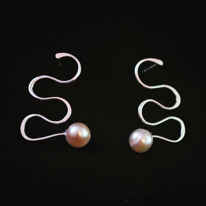 " Undulation" Earrings 1.25"x.75"x.25"
silver, pearls #handmadejewelry #oneofakind #pearls #silver #earrings #custom