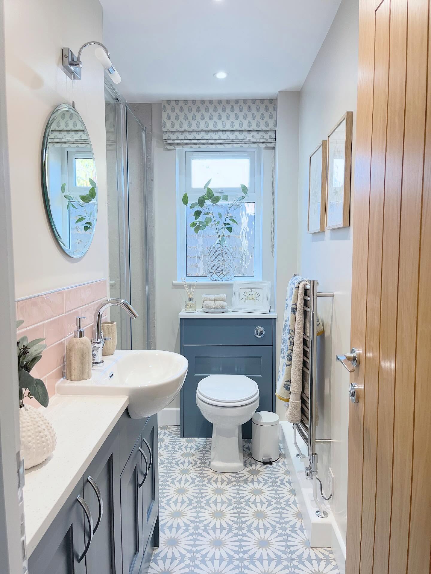 ~ Swipe to see the journey of this guest bathroom transformation.
~ What started as a very outdated space with a corner bath, and office-style vertical blinds also had a layout that simply didn’t work for my client.
~ To get it right, we knocked down a wall and relocated the airing cupboard, making this room smaller and allowing the ensuite next door to be larger and far more functional.
~ The middle images show the messy middle. Walls moved, space reworked, replastered and then almost there but still missing the finishing touches. No window treatment, no styling, no warmth.
~ The final result is a completely reimagined guest bathroom. Patterned floor tiles with underfloor heating, bespoke teal blue cabinetry housing the WC and basin, soft pink splashback tiles, a warm oak door and layered details throughout. Textured towels, oak-framed artwork, a statement mirror, greenery and a beautiful Pure Edit patterned Roman blind to soften the space.
~ A great reminder that the magic isn’t just in the finishes, it starts with getting the layout right and ends with thoughtful styling.
~ If your bathroom works but just doesn’t feel right, this is exactly where a design-led makeover can make all the difference.
#interiordesigner #homemakeover #beforeandafter #realhomes #designinspo
interior designer hampshire | interior designer south east | interior design services | room makeover service | hire an interior designer | design help for homeowners | layout planning | space planning | home styling | interior design support | design only interior designer | no renovation interior design | real homes interior design | timeless interiors | calm interiors | relaxed interiors | design for everyday living | professional interior designer | help pulling a room together | design confidence | home refresh ideas | interior designer for families | Amy Elizabeth Interiors