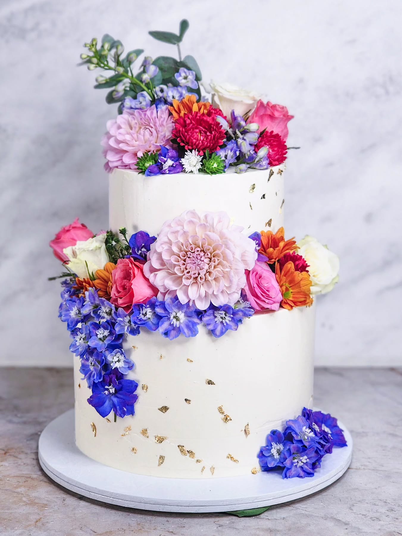 Beautiful Floral arrangement for an 80th Birthday Celebration. #GlutenFreeCake #80thbirthdaycake #freshflowerscake #2026Bakes #Marlenebakes