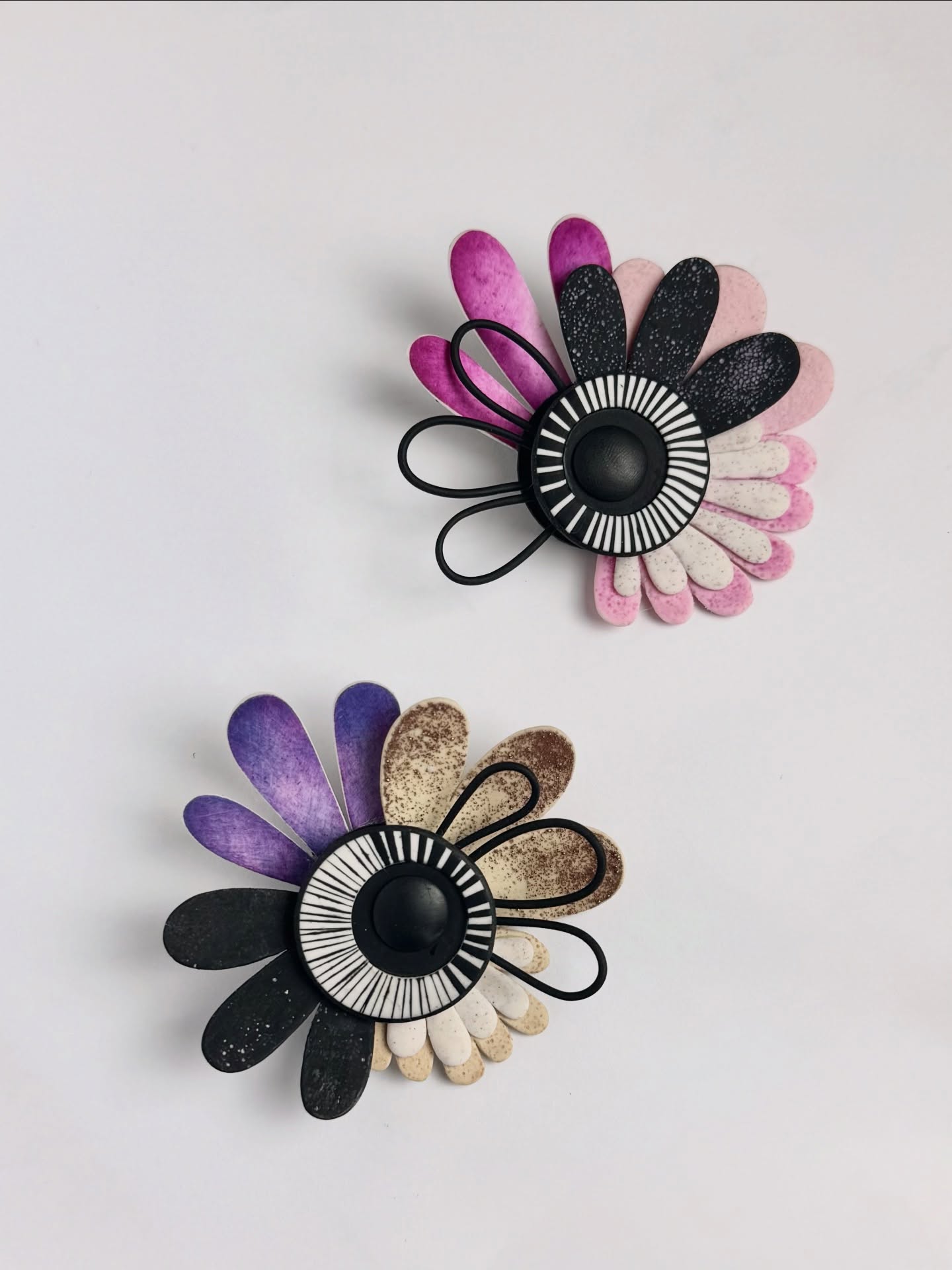 A little behind the scenes glimpse of working on the new polymer clay class. 🌸
These Spinning Flowers blew my mind for many weeks — from trying to figure out the construction, individual rotating elements, colour palettes, the play of contrast and textures…
Another crazy jewellery project that hides many wearable options and possible adjustments. And a few more adventures across Europe awaiting. 🎉