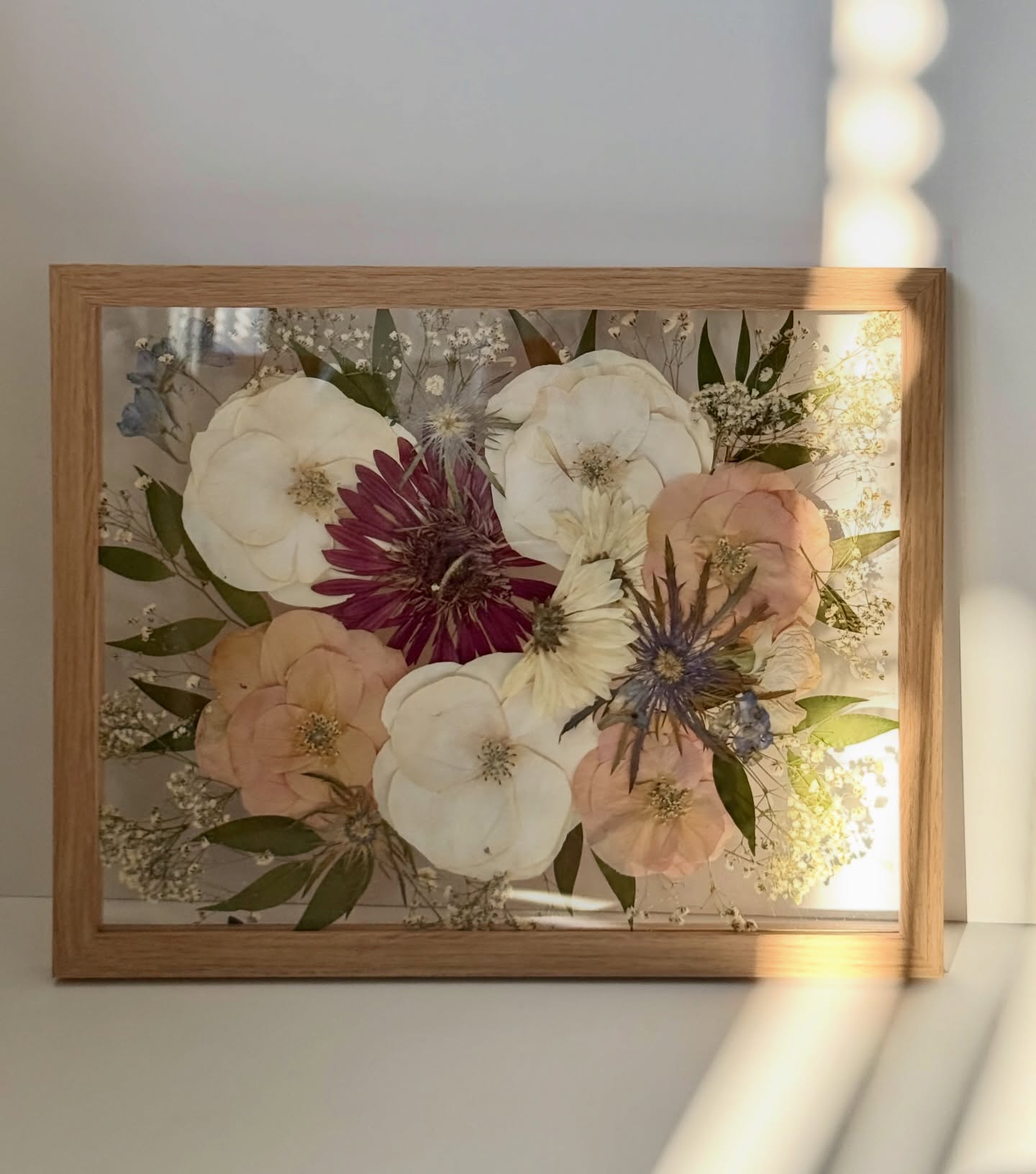 Thank you Jasmine, for trusting me with something so meaningful 🤍
Now preserved in an 11x14 floating frame, your bouquet is held in a way that still feels light and full of movement. A gentle pause in time, without losing what made it yours. 💌
And if choosing between a pressed frame and resin feels impossible… you don’t have to 🤭
The pressed frame can be your main keepsake, with resin add-ons that let you carry small pieces of your bouquet into everyday moments.
Pressed 11x14 Floating Frame + Resin Coasters + Christmas Ornaments
Vancouver flower preservation | bridal bouquet keepsake | pressed flowers Canada | 2026 bride | Wedding flower preservation | flower preservation