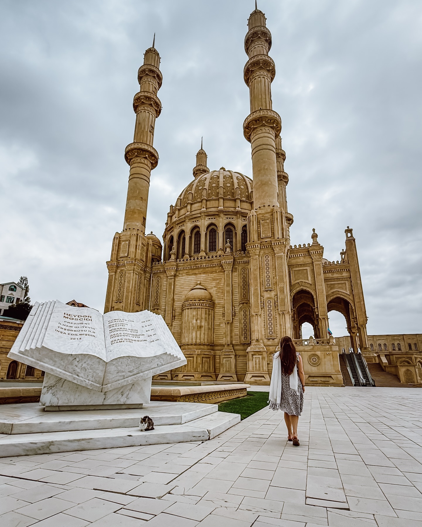 If you find yourself in Baku, make sure to set aside time to visit Heydar Mosque. It’s one of the largest mosques in the Caucasus and the scale is what really stands out when you see it in person. I loved all the intricate carving details on the exterior and also the open book sculpture at the front that symbolizes knowledge and has the signature of the former president Heydar Aliyev on it.
It’s outside the main downtown area of Baku, but getting there is pretty easy. It’s about a 15 minute drive from the Old City and the simplest option is a taxi or Bolt. It’s not part of the typical tourist route in Baku, so I basically had the place to myself for photos.
Visitors can enter outside of prayer times as long as you dress in mosque appropriate attire. It’s a peaceful change from the busy parts of the city!
Save this post for your visit to Azerbaijan 🇦🇿
#vacation #travelblogger #travelblog #traveltheworld #traveling #traveler #solotravel #sheisnotlost #traveltips #solofemaletraveler #travelinspiration #travelhacks #travelagent #traveladvisor #vacationplanning #travelplanner #travelagency #luxurytravel #travelagents #travelexpert #travel #dreamvacation #vacationplanner #traveldeeper #baku #azerbaijan #heydarmosque #flametowers #bakuazerbaijan #visitbaku