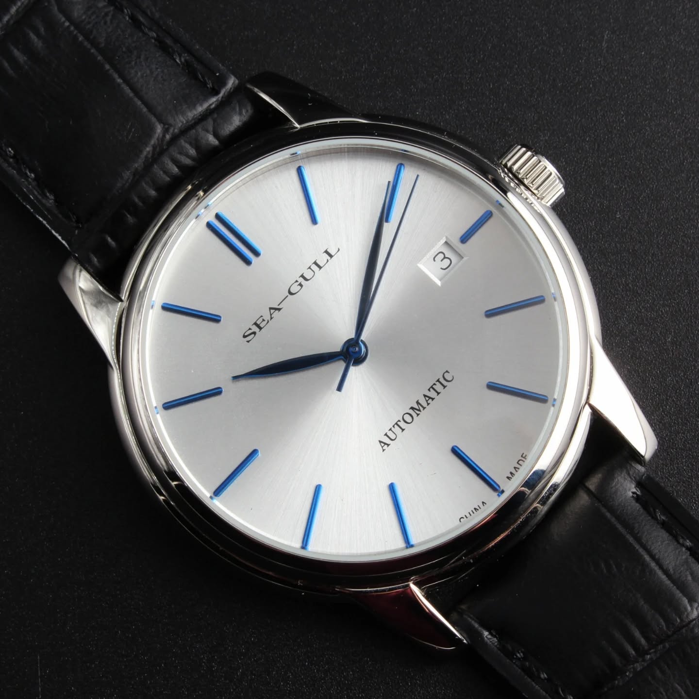 This Seagull automatic timepiece boasts beautiful blue hour markers and a minimalist silver dial with a date display. Classy.
https://www.seagullwatchcompany.com/product-page/seagull-blue-hands-silver-dial-automatic-dress-watch-d819-616?currency=USD
#SeagullWatch #DressWatch #AutomaticWatch #BlueHands #silverdial