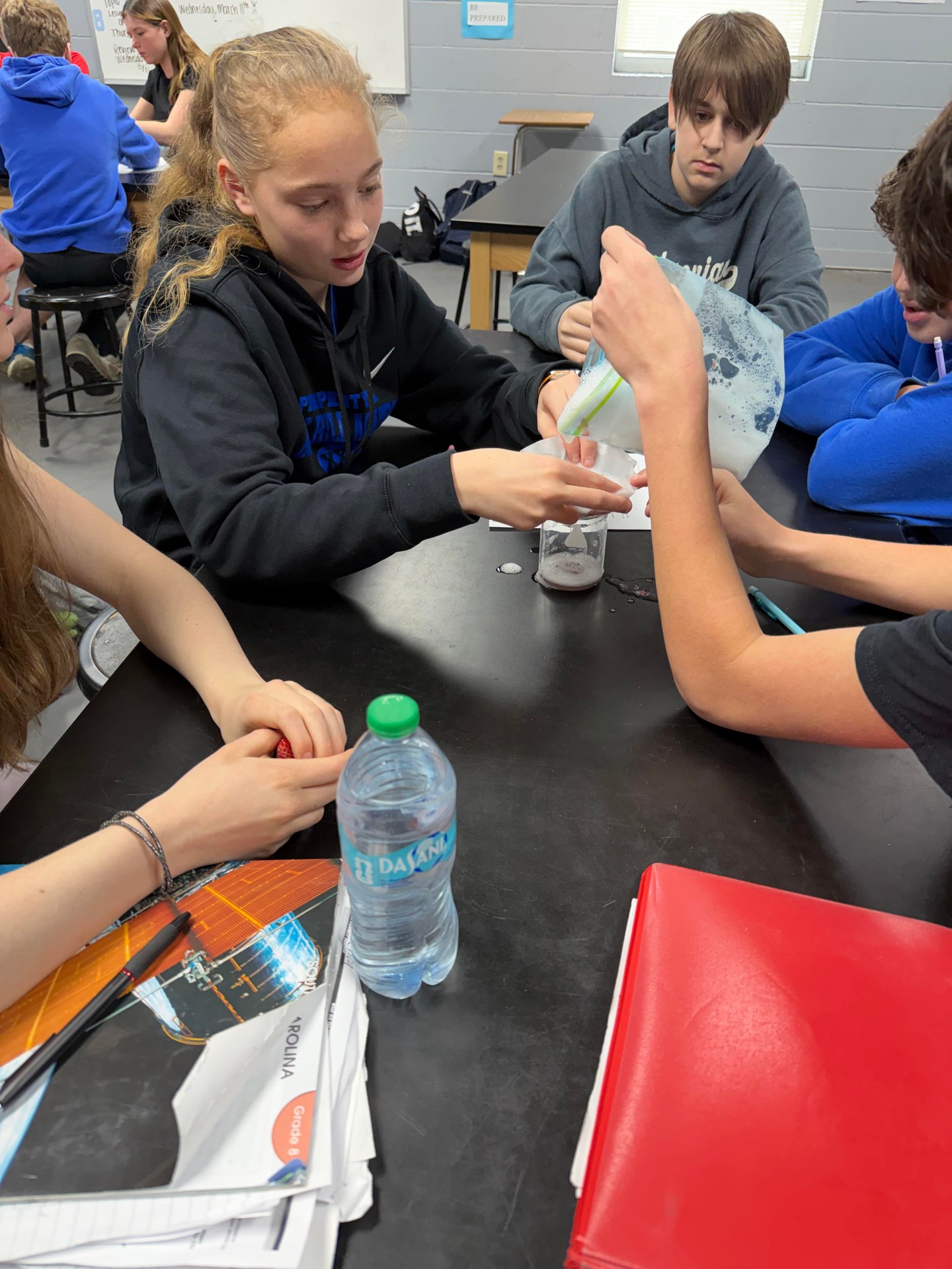 8th graders have been studying DNA and today they conducted an experiment using salt and soap to break down a strawberry’s cell wall and rubbing alcohol to extract its DNA! 🍓 🧬