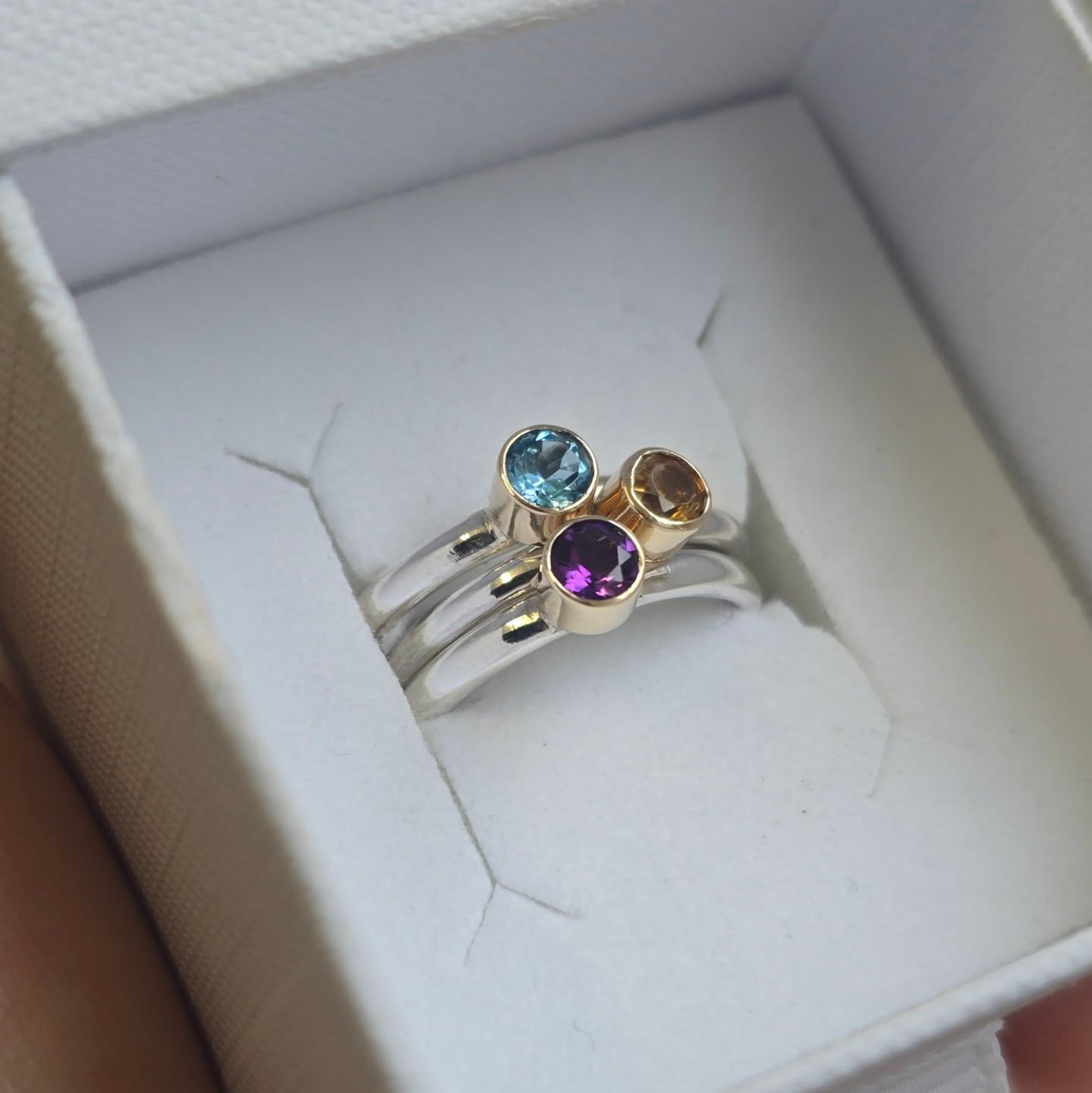Love this set of three birthstone stacking rings ✨
Each ring has a silver band and a 9ct gold setting that really brings out the rich tones of the gemstones.
💜 Amethyst
💙 Topaz
💛 Citrine