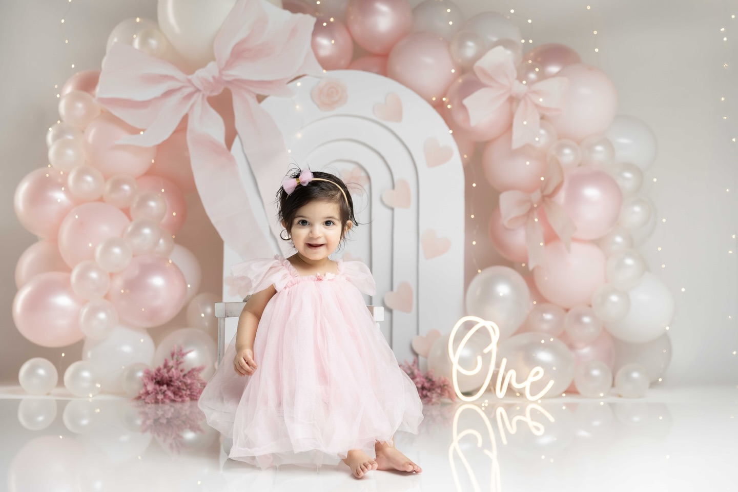 Soft pink and white pearl balloons and bows to celebrate this sweet girl’s first birthday. We always love inviting older siblings to join for a few shots, and when they cooperate together, it’s the sweetest thing. These moments are so special!
Photo sessions in Calgary AB
Cake smash session
Picstoria Photography
#calgarycakesmashphotographer #calgarycakesmashphotography #yyccakesmashphotographer #calgarybabyphotographer #yycnewbornphotographer