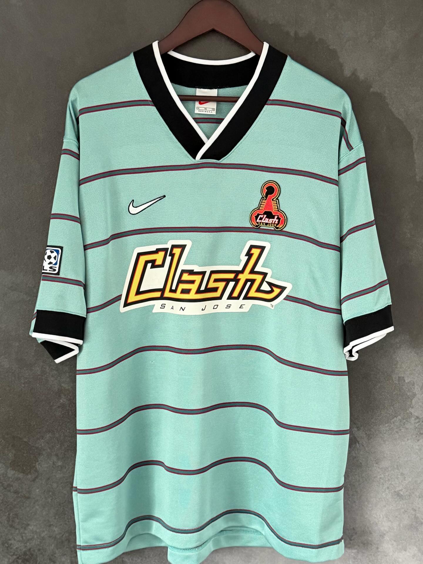 San Jose Clash 1997 Third by @nike
Why Clash?..
The name reflected the league’s original vision: fast, physical, high-energy soccer designed to “clash” with traditional expectations of the sport in the U.S. It sounded dynamic, aggressive, and modern — very much in line with mid-90s naming trends (think Burn, Mutiny, Wiz).
It also subtly nodded to San Jose’s tech-driven, Silicon Valley identity — innovation, disruption, impact.
The Scorpion reflects the wildlife of San Jose with the animal being native to the area, I suppose it’s also meant to intimidate, in that cute American way
But while it was bold, it never truly felt rooted in the city’s deeper sporting identity.
Why the name change?
By 1999, MLS was shifting away from experimental branding and toward more traditional, globally familiar club identities. The Clash name felt very “90s MLS” — flashy but not timeless.
In 2000, the club rebranded as the San Jose Earthquakes, reviving the name of the NASL team that had played in the Bay Area in the 1970s. That move reconnected the club with local history and gave it more credibility with long-time soccer fans.
The change worked. Under the Earthquakes identity, the club went on to win MLS Cups in 2001 and 2003 and built a much stronger, tradition-based culture.
While I think the the new name is not bad, I still think it’s a cool name, and it’s definitely something America would call a football club.. There is something just so very special about the 90s MLS.. it was just a completely mad but incredibly fun style of football. something I think that should be remembered as our game becomes more and more sterile and more about rules than the pure joy of sport
What’s your favourite 90s MLS jersey?
#sanjose #mls #soccer #jersey #90s