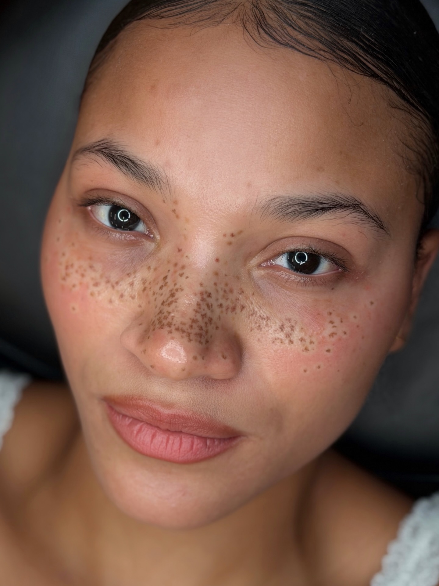 Freckle correction ✨
These freckles were originally done by another artist. Instead of trying to fight the existing pigment, I added new freckles to soften the pattern and create a more natural nose contour.
Freckle work is all about placement. A few freckles in the right spots can completely change how natural everything looks.
Swipe to see her before >>>