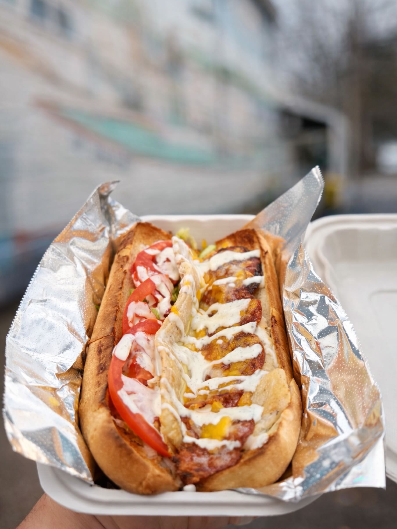 There was a murder at the CHICKEN RANCH. We heard that BACON was used the lure the victim. CHEDDAR be careful out there! Don’t be a victim and try our special today - Chicken Bacon Ranch Subs with Cheddar! And get this — our RANCH IS HOMEMADE! Or you can order it with HOMEMADE HONEY MUSTARD!