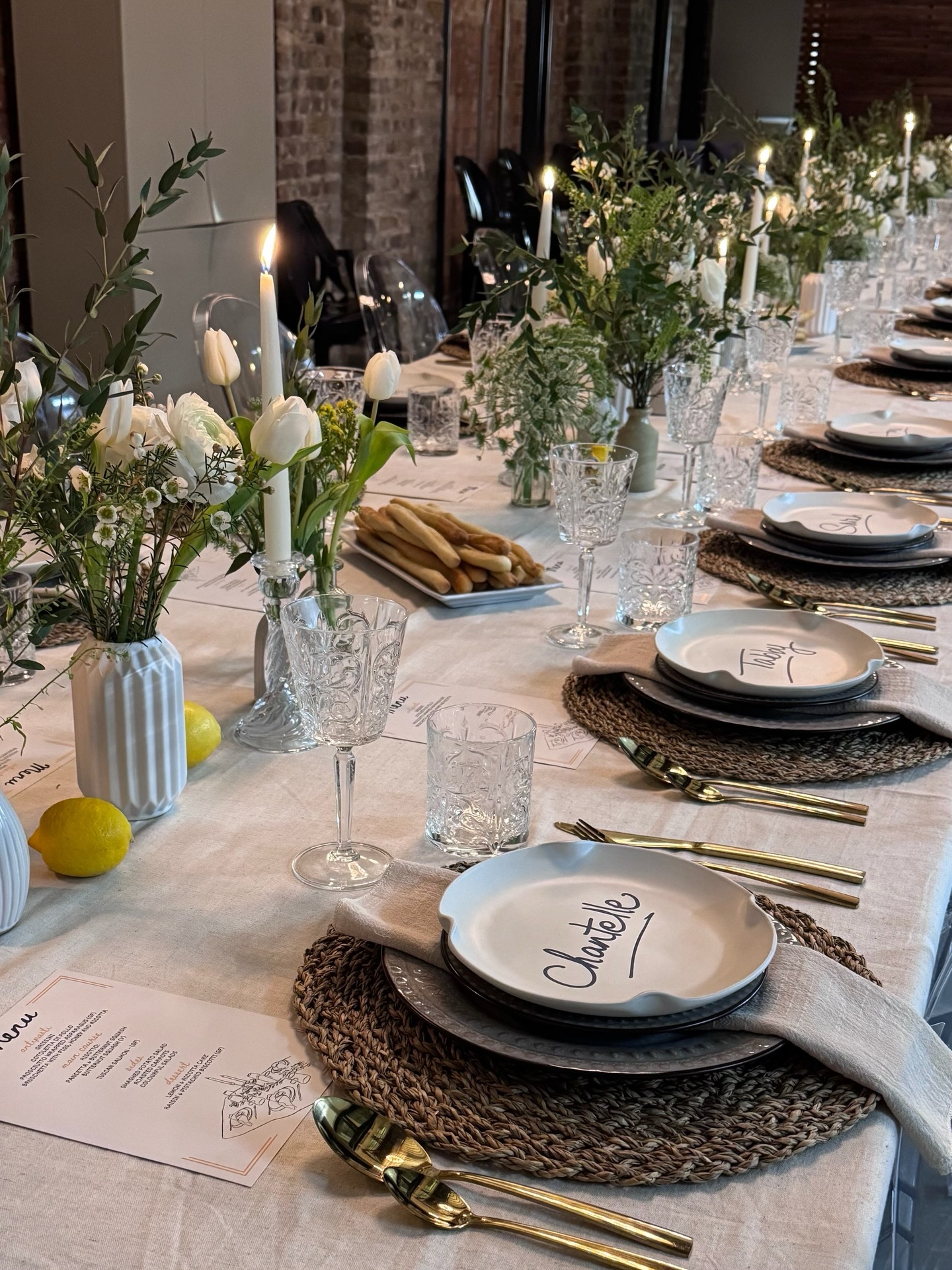 Sometimes the brief evolves once you’re in the space.
For this dinner with @smeg_uk , the table needed to work just as beautifully as it did practically. Alongside the styling, there needed to be space for wine bottles and sharing platters to flow naturally throughout the evening.
So on the day we adjusted the layout slightly — widening the rhythm of the centre styling and creating intentional gaps along the table for serving pieces to sit comfortably within the design rather than feeling like an afterthought.
The result was a table that still felt full and layered, but allowed the evening to unfold effortlessly around it.
Natural textures, soft whites, fresh greens and candlelight kept everything relaxed and elegant — exactly the mood the brief called for.
If you are the company who did the name writing on the plates, please let us know so we can take you
Images from the Smeg UK event