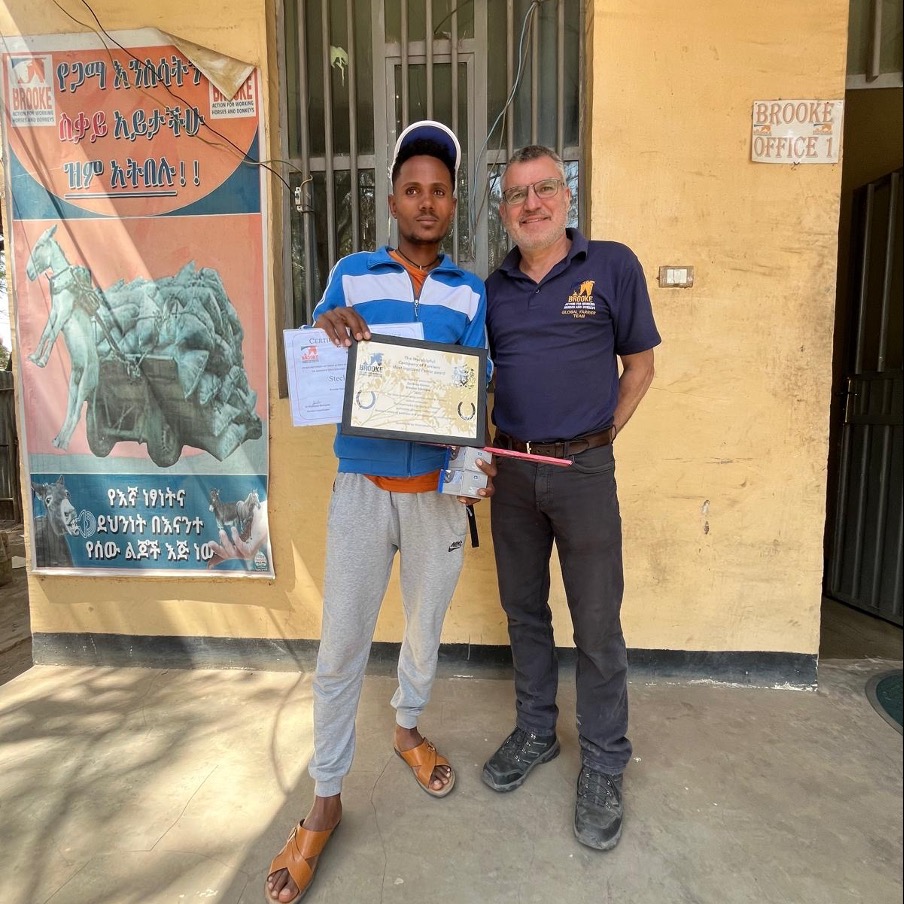 @Brooke has partnered with @worshipful_company_of_farriers (WCF) on a new award scheme, celebrating the work of farriers globally.
The annual Farriery Progress Awards celebrates Brooke-trained farriers who have shown commitment to the welfare of working horses, donkeys and mules.
Salou Fall from Senegal, Zerihun Girma from Ethiopia, and Muhammad Maqbool from Pakistan were the 2025 award winners, recognised for their dedication to improving standards in the farriery trade.
Angus Wiseman, Brooke’s Global Farrier Advisor, said: “Each of the recipients have demonstrated a focused commitment to developing their own farriery knowledge and skill, as well as being proactive in sharing their learnings with their peers. In doing so are, they are contributing significantly to improving the comfort and welfare of working animals lucky enough to be provided with their farriery care.”
Each winner was awarded with an engraved plaque, a personalised leather tool roll and essential farriery supplies – sponsored by UK farriery supplier, @stromsholm_ltd Ltd. John Cowper-Coles, Master of the WCF, said: “I am delighted to see our joint farriery initiative with Brooke flourishing. I warmly congratulate the winners and thank everyone who has supported this new award, which will help to further raise farriery standards and improve equine welfare internationally.”
Brooke and the WCF will join forces again when members of the Company will run the London Landmarks Half Marathon on 12 April, raising funds for the Charity and the WCF Charitable Trust.
Both organisations have a long-standing partnership over the years, with a shared aim of improving equine welfare.
Founded in 1356, the WCF promotes high standards of farriery and horse welfare. The award highlights the impact of Brooke’s Global Farriery Programme in improving equine welfare worldwide.