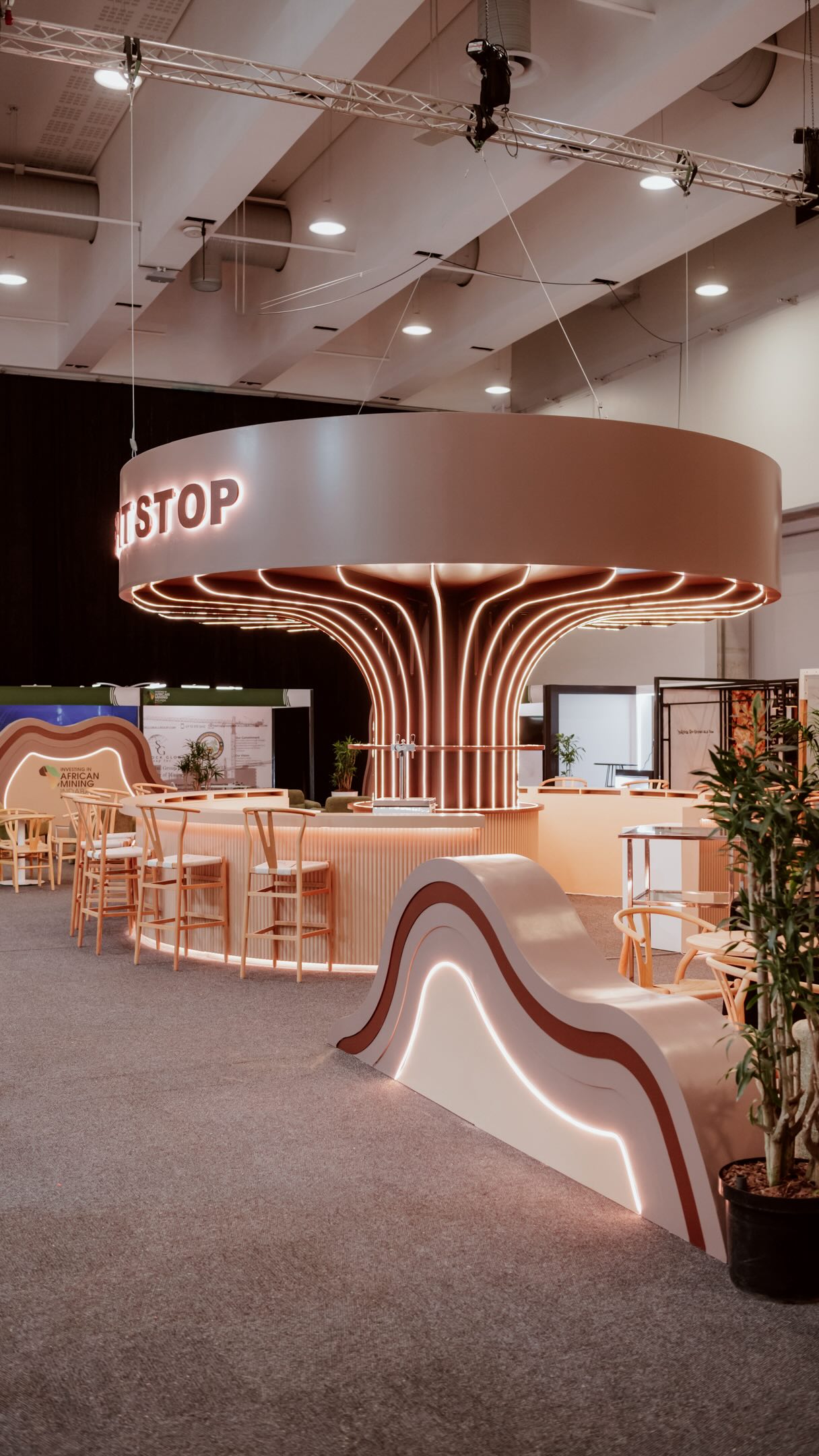 ✨Welcome to The Pit Stop✨
From the moment you stepped inside, the organic shapes set the tone. Soft, flowing layers ripple across the space like carved contours in the earth itself.
Warm lighting, natural textures, and curves that guide your eye from one feature to the next. Nothing rigid. Nothing forced. Just a space that feels effortless to move through.
Because sometimes the most powerful design move is simply creating a place people want to stay.
#MI26 #miningindaba2026 #happinestcustom #capetown #expobuilders