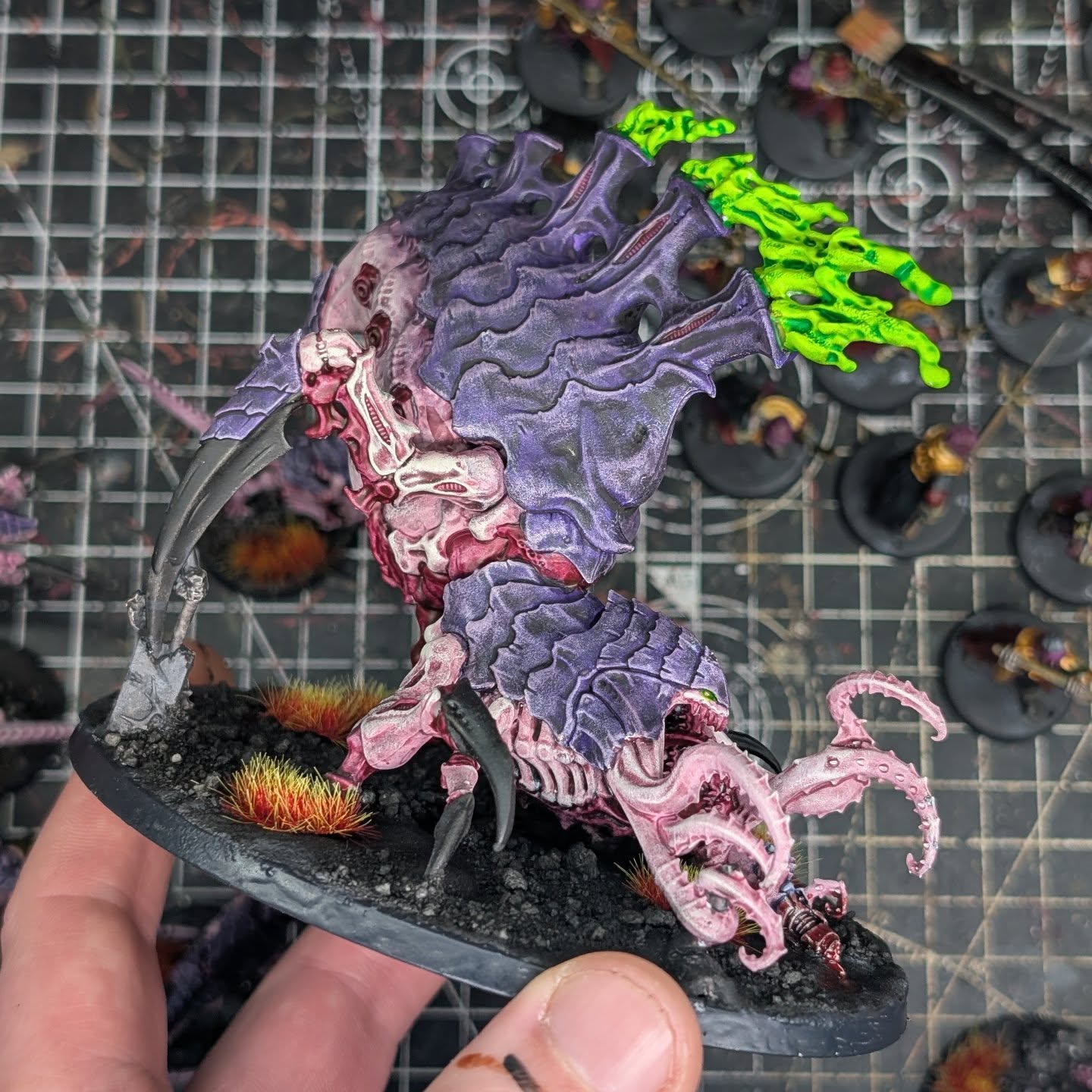 The biggest purple and pink freak I've painted so far. I'm always curious when you have to stop defining something as a miniature painting, and just call it a painting. Because this dude felt like no miniature. Soon I'll have multiple things back on my shop for sale, so if you're looking to grab this guy, or commission me for some other equally heinous looking creature, get in touch