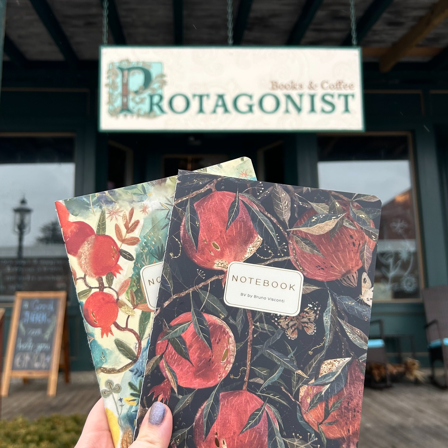 A gloomy day (or any day, really) is the perfect day to visit @protagonistbooksandcoffee . It's cozy, they have these beautiful notebooks (you know Oracle loves a pomegranate!), and you can sit with a coffee, a book, and an Oracle chocolates bar or rice krispy treat... Come to think of it, we might need to go back and stay for a while ourselves.
And! When you buy Oracle treats at Protagonist, you get to support TWO local businesses at once! Which we think is pretty cool. Go forth, and get books!