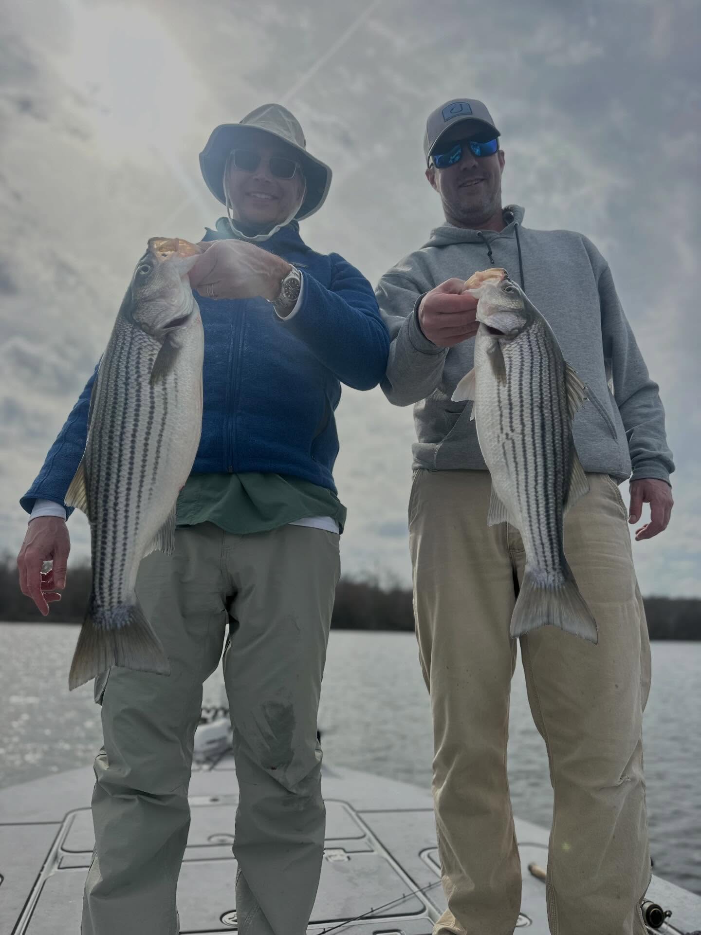 Always plenty to eat, lots of laughs and fat stripers with Todd and Parker onboard. What a beautiful day! Enjoyed it Friends! #striper #striperfishing #inshorefishing #winter #bookatrip