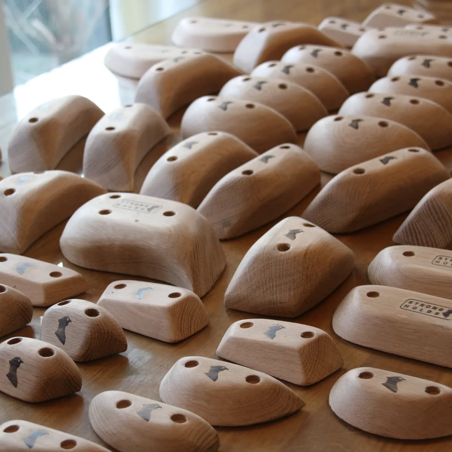 A couple of large orders working their way through the workshop this week, some slopers and a chunky set of large oak holds - this batch of timber is top drawer...
#oakclimbingholds
#strongholds
#climbingholds #training