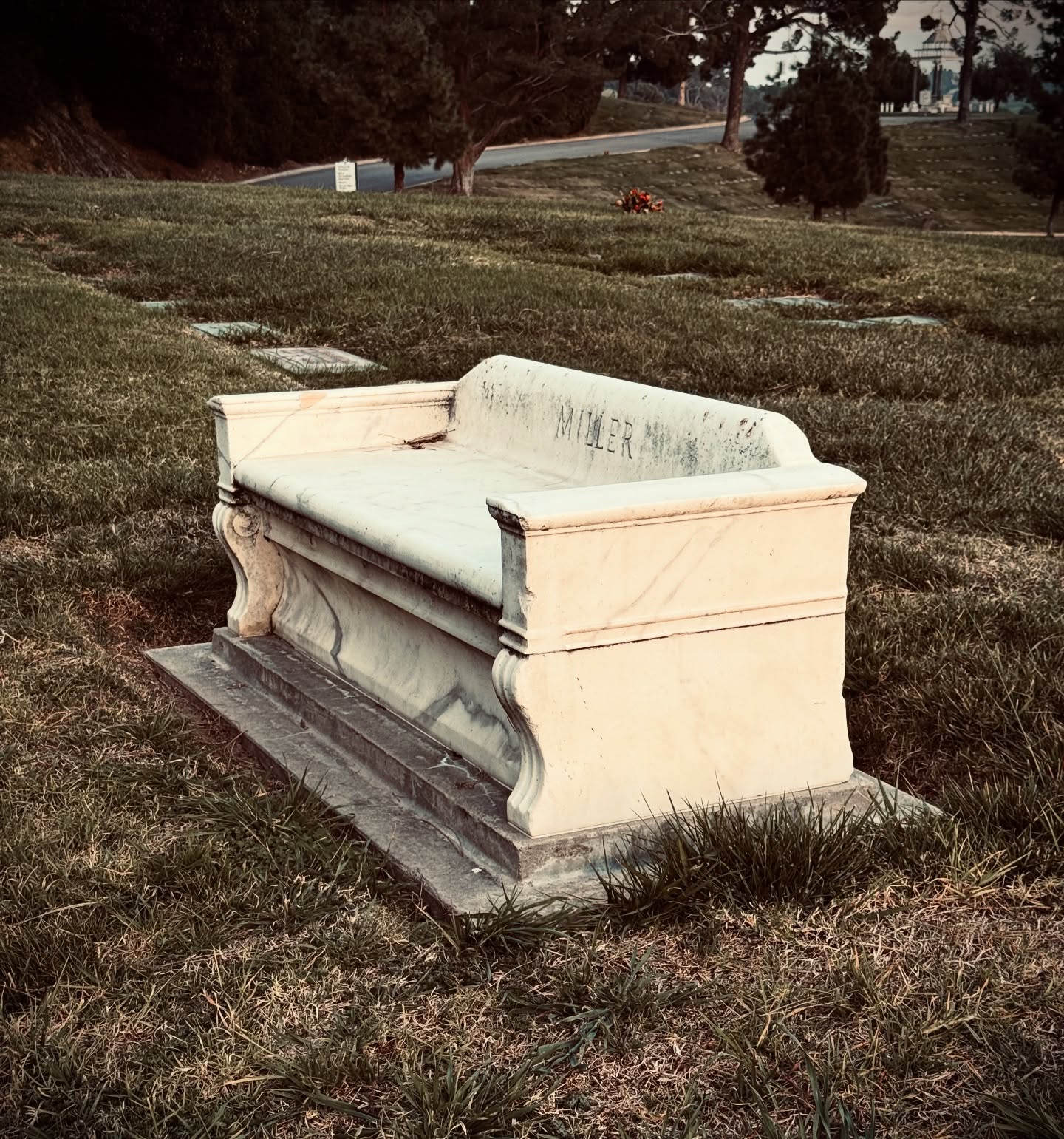 After a long day of grave hunting, sit and rest a while on a cemetery couch.
