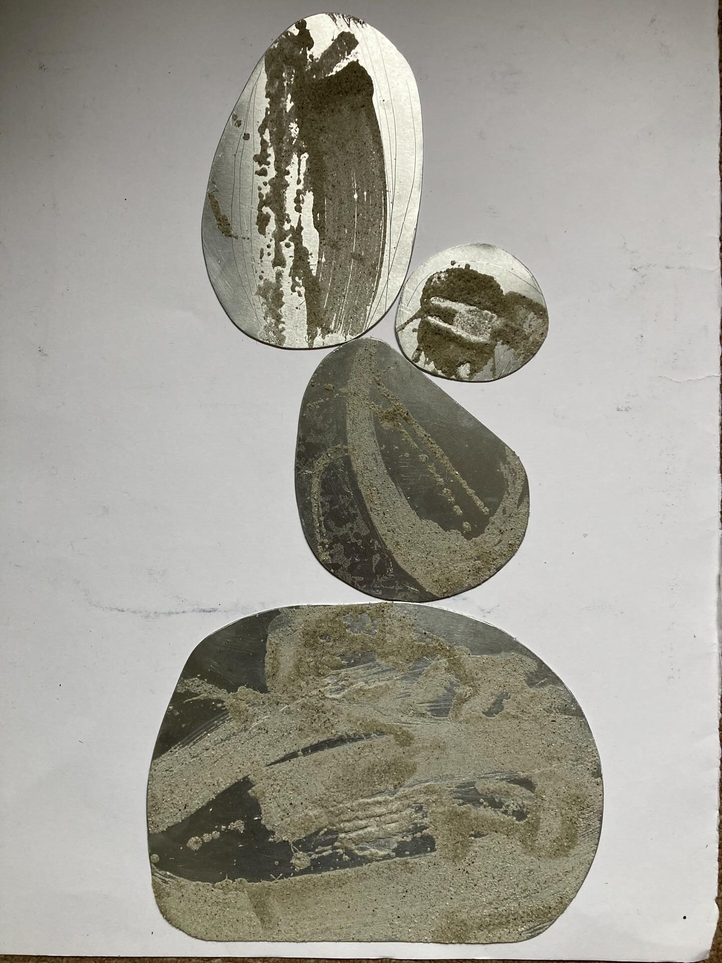 Glacial flour on shaped aluminium, carborundum blind embossing. The flour is sifted from the glacier, it’s sharp and not quite as ground as ordinary carborundum, but it produces unusual marks and probably holds the ink differently. Apparently the minute particles that are suspended in the glacial ice are responsible for refracting light creating the beautiful blue hues.#glacialflour#contemporaryprintmaking#blindembossing#merdeglace