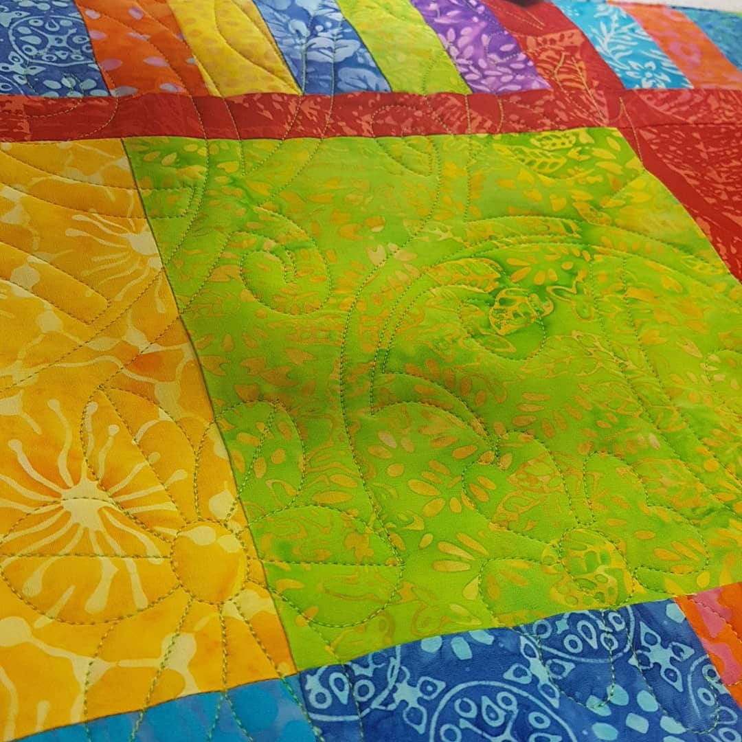 I started my week off quilting this cheerful Batik quilt. I used an edge to edge pantograph called "Late Bloomer" using a lime green thread top and bottom. I wish I had of taken a picture of the backing Jes used as it was a perfect blend of all the colours in the quilt top!
#quiltingismypassion #quiltersinvictoriabc #longarmquilter #quiltersgottaquilt #quilting #scrappyquilts #quiltersofinstagram #quiltpath #longarmquilter #apqsmillie30 #quiltpath #canadianquilter #batikquilt #onlinefabricsales #mistymountainvictoriadotcom