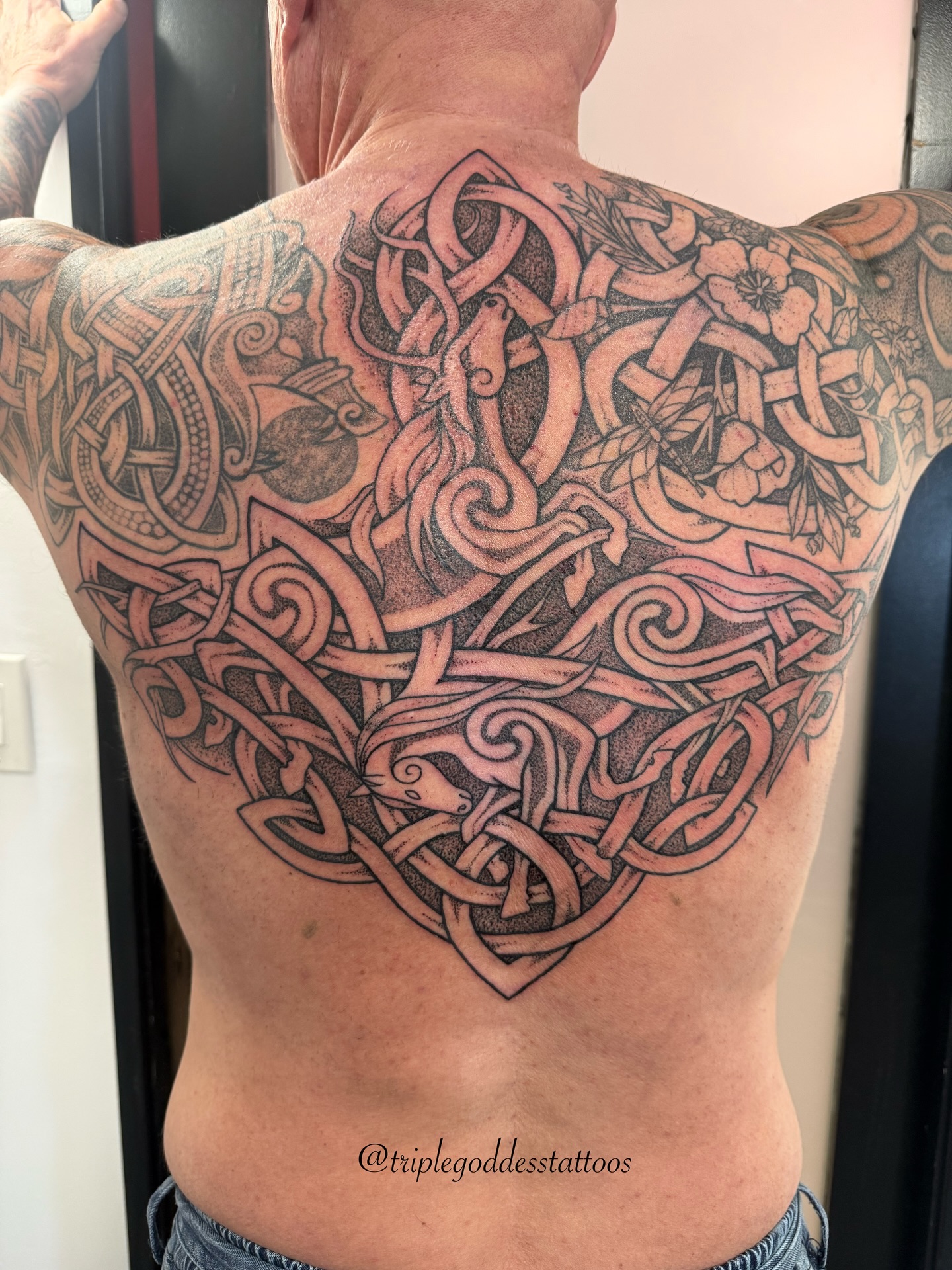 When I was a child, the first subject that made me want to be a good artist was drawing horses. Then, it was seeing a Celtic knotwork book by the legend @courtneydavisart and wanting to learn how to create the intricacy of knotwork.
-
So, to put these two loves together… I just cannot tell you how much fun I had with this one! It is of Odin’s magical shamanic horse Sleipnir (with eight legs on the bottom) and Loki as the mare who birthed him.
-
And it’s one one of my favourite people, Matteo, who I have been tattooing for about 10 years. He actually has my very first full Nordic knotwork sleeve I ever created (and a second one from about 5 years later). So there is just a lot of love in this piece of art. Thank you Matteo for being your kind, supportive and badass self.
-
Míle buíochas!!
-
#triplegoddesstattoos #knotworktattoo #nordictattoo #vikingtattoo #celtictattoo
