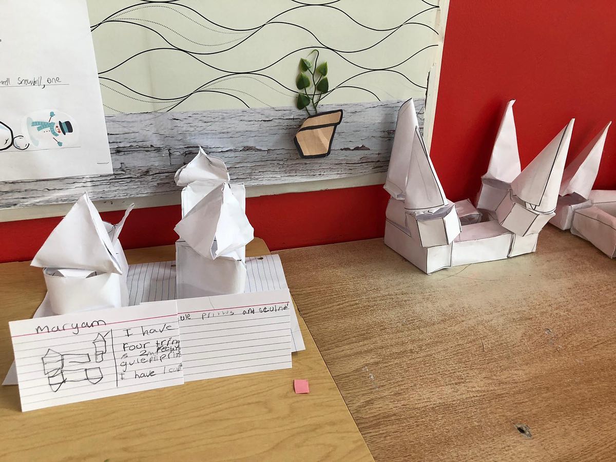 And Grade 3 were moving in the same geometric circles! They were challenged to create 3D castles from paper. They used nets to explore the patterning of 2D shapes for 3D effect. They classified shapes by vertices and angles and recorded their observations. #alifcanada #alifcanadaschool #geometry #mathisfun