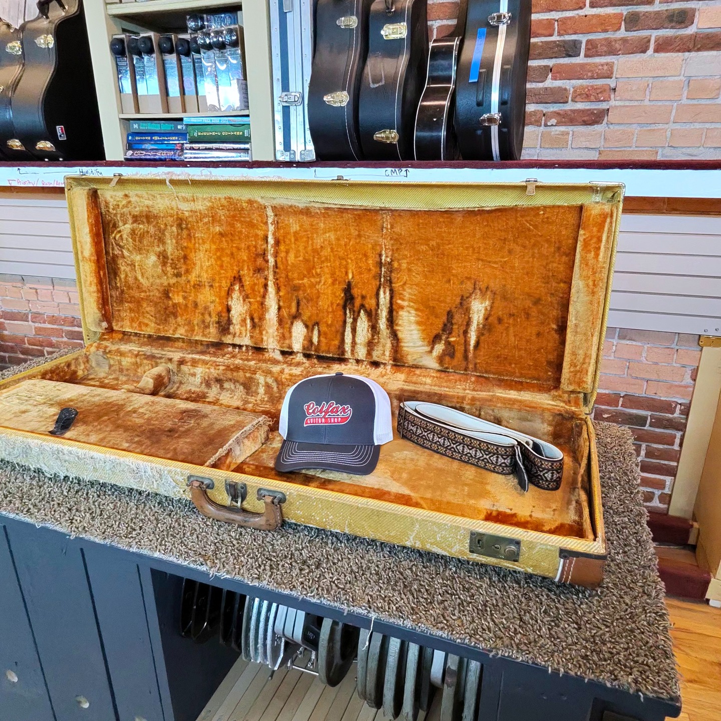 Check out this 1959 Fender Jazzmaster we have for sale in the shop.
The 1959 Fender Jazzmaster is a highly coveted vintage offset guitar with two wide, "soapbar" single-coil pickups with a distinct dual-circuit (lead/rhythm) layout.
This guitar is all original (including case) - except for a refret.
It is from the second owner whose cat “Bobcat” got their claws on the case.
This guitar is ready for your hands. Come on in or call the shop if you are interested.