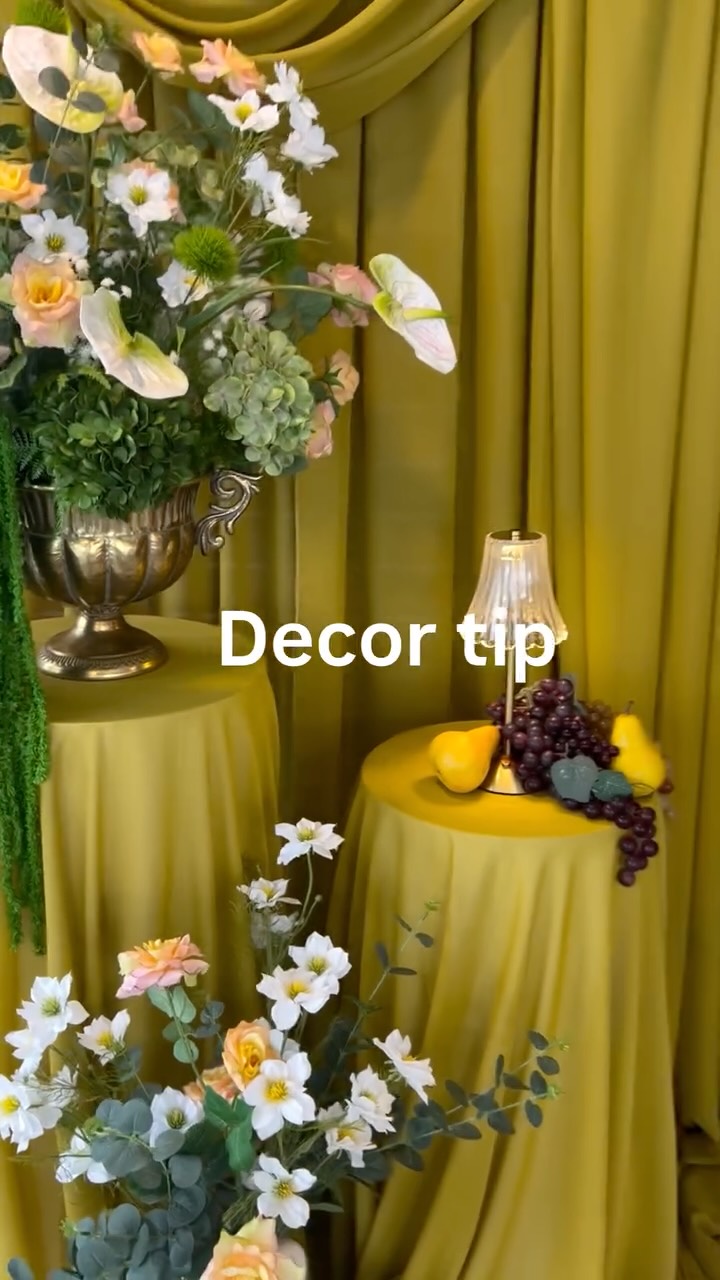 Having a statement piece in an otherwise blank space naturally draws the eye and gives the room a focal point. It helps pull the entire space together and brings life to the décor. By focusing on one statement piece that can be repurposed, you also add both style and functionality. For example, it could serve as a photo space or ceremony backdrop, and later be transformed into the backdrop for a sweetheart table. You can then tie in your table décor to accent and complement that main piece, creating a cohesive look throughout the event.
Decor @bloom_shack