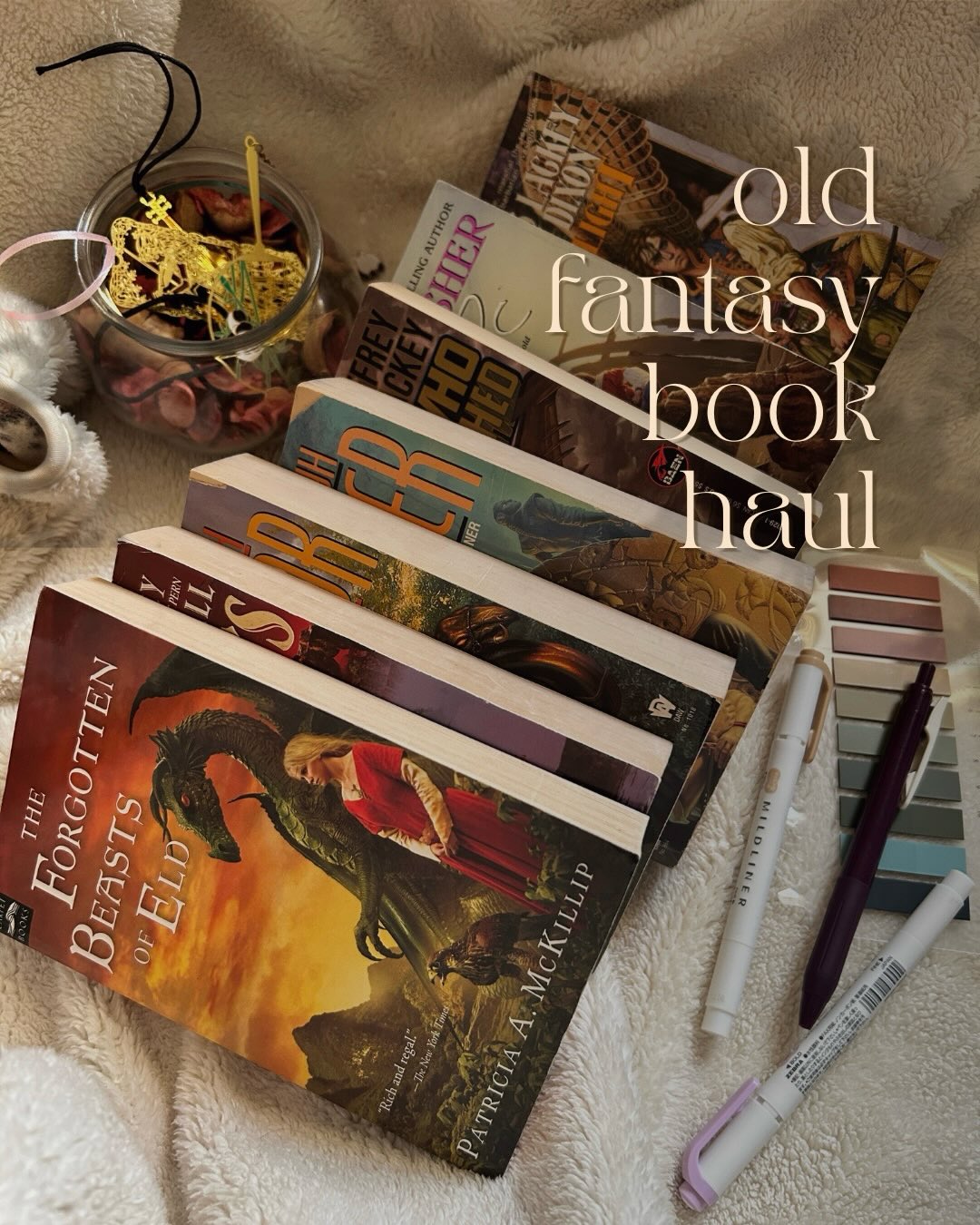— old fantasy book haul
lately, i’ve been in the mood for more classic fantasy writing so (together with my other backlog epic fantasies) i’ve been exploring older releases bc something in me unlocked when i realized how many female authors there are in older Adult/YA SFF. i went on a few book store thrift hunts and landed with these:
1. forgotten beasts of the eld by patricia a. mckillip
2. wild magic (fool’s gold series) by jude fisher
3. invader and inheritor (foreigner series) by c.j. cherryh
4. the ship who wrecked by anne mcaffrey & mercedes lackey
5. acorna’s auest by anne mcaffrey & margaret ball
6. owlflight by mercedes lackey & larry dixon
personally, i think this was a successful thrift hunt ✨ especially given how mmpb’s have gone out of print, the paperback lover in me was heartbroken
i love stories that are able to balance different emotions and use various character interactions to build it’s lore without forgetting it’s fantasy base and themes 🤍 i have hopes that at least some of these will be a new fave~