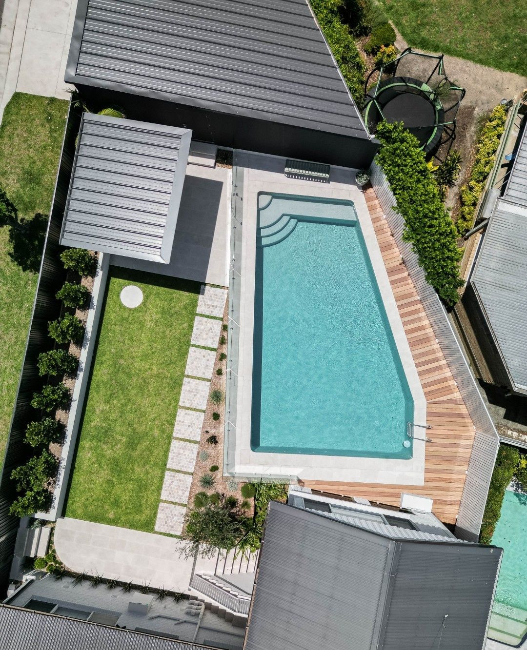 A look down at our recent collaboration with Corey Fox Landscaping.
This project featured the Luxe Cantilever and also involved re-roofing the garage at the rear of the property.
We talk often about our pergolas, carports and decks, but our Versiclad roofing is so versatile it's a fabulous cost-effective option for re-roofing standalone buildings like garages, granny flats and studios. As a single product that contains the exterior metal roofing, the inner core for insulation, and the undermounted ceiling finish, Versiclad is the ideal all-in-one roofing solution.
So if you're looking at giving your freestanding garage or studio a glow-up, speak to us about how we can help!
🦊 @coreyfoxlandscaping
☀️ @luxecantilever by @lifeoutdoors.com.au
☀️ @versiclad
🧱 @cinajus
📸 @benandgab
🏠 @the_landscape_association & @hia_au
==========
Life Outdoors are Sydney's expert builders and installers of pergolas and insulated roofing including Luxe Cantilever. Head to our website or call 0414 415 238 for a free quote. 