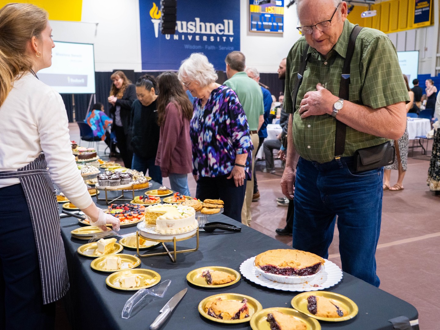 Serving up sweets in preparation to serve faithfully!
Thank you to all who came to our Missions Benefit to support our students for their upcoming trips to Cambodia and Kosova this summer! We hope you enjoyed the sweet desserts, creative auction baskets, and fun moments with our mission teams!
If you want to read more about and support our missions teams doing global good, visit our missions webpage: bushnell.edu/student-life/campus-ministry/mission-trips/