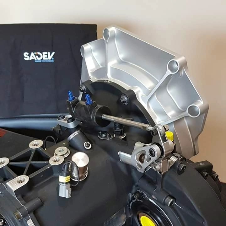 SADEV ST90-17 2WD Transverse Sequential Transmission fitted with new, fresh SWR-designed adaption parts 🤩:
* A bellhousing adaptor plate for the gearbox to fit a TOYOTA YARIS GR engine - designed, machined and vapour-blasted in house.
* A paddle shift mounting adaption kit for the GEARTRONICS pneumatic actuator using our pivot system, keeping the profile tight to the gearbox. 👍
#SWRMotorsport #SADEV #sadev #transmission #Transmission #Gearbox #geartronics #motorsport #engineering #DesignandEngineering #racing #machining #PaddleShift #aluminium #motorsports #cnc #design #Sadev #cncmachining #competition #aquablast #sequential #circuit #gearbox