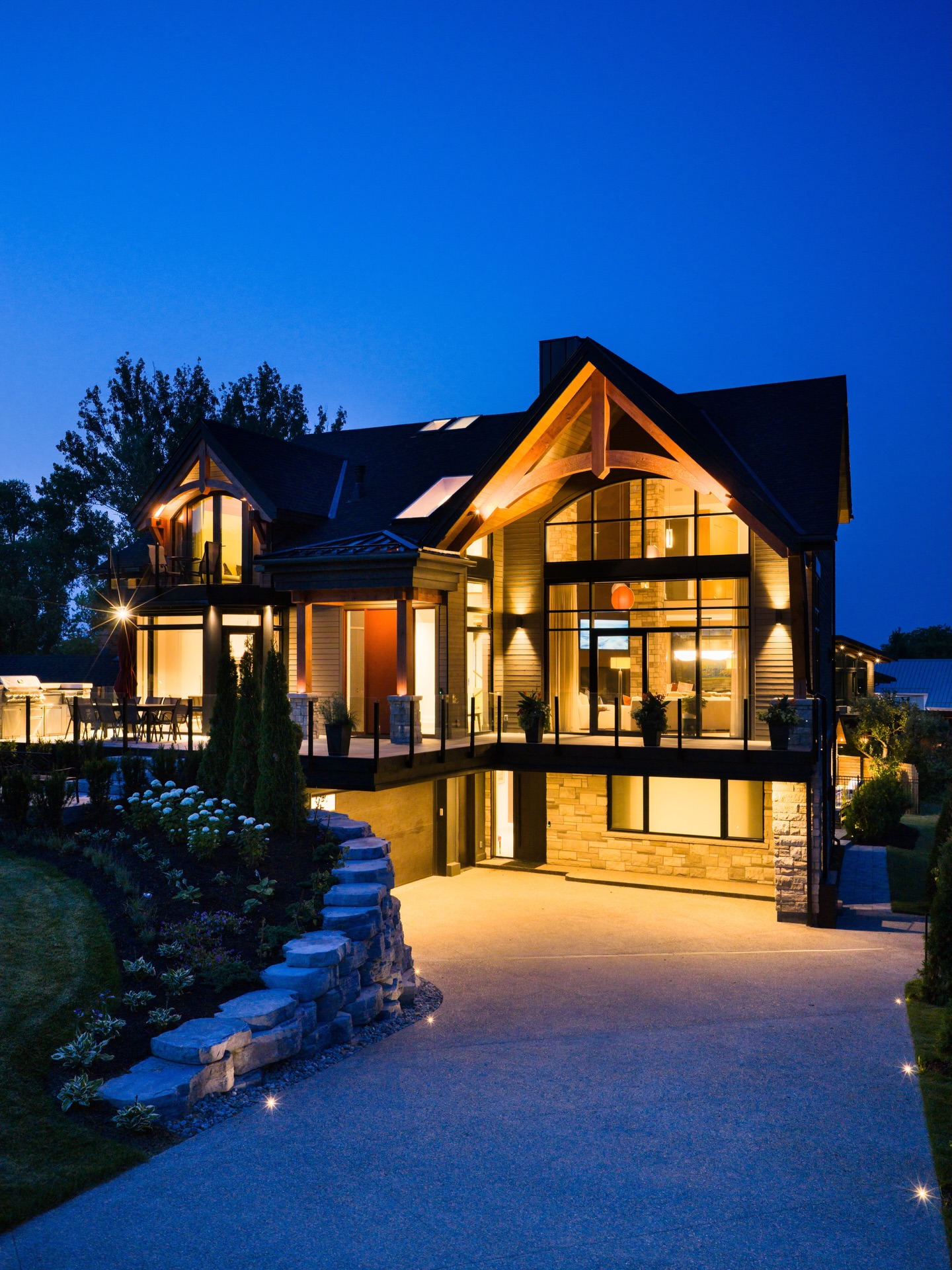 Step inside this stunning chalet at the base of Craigleith Ski Club.
Designed for every season, this home has it all. From the heated driveway for an easy winter, to the backyard pool perfect for summer days. The floor to ceiling fireplace in the central living space is just one of the many unique features across this home.
The basement of this chalet features an entrance specifically designed for coming home from skiing, a gym, a temperature controlled wine cellar, and a full golf simulator so you can play all year round!
It’s a true showcase of the craftsmanship and attention to detail that PattyMac delivers.
Follow @pattymacbuilt for more home & cottage inspiration!
.
.
.
The team involved:
Built by @pattymacbuilt
Design by @asladearchitects
Interior Design: @karenkaynedesign
Roofing and Skylight Install: @advancedroofing_sheetmetal
Roofing: @advancedroofsolutions
HVAC: @affordablecomfort
Exterior Cape Cod, Cedar, Cabana Interior Finishing: @centurymilllumber
Fireplaces: @chanticofireplaces
Framing Material, Interior/Exterior material: @collingwoodhomehardware
Flooring: @efloortoronto
Pool: @georgianbaypools
Interior Stairs and Glass Railings : @Greywoodcustom
Tile Install: @mcmdlussotilestudio