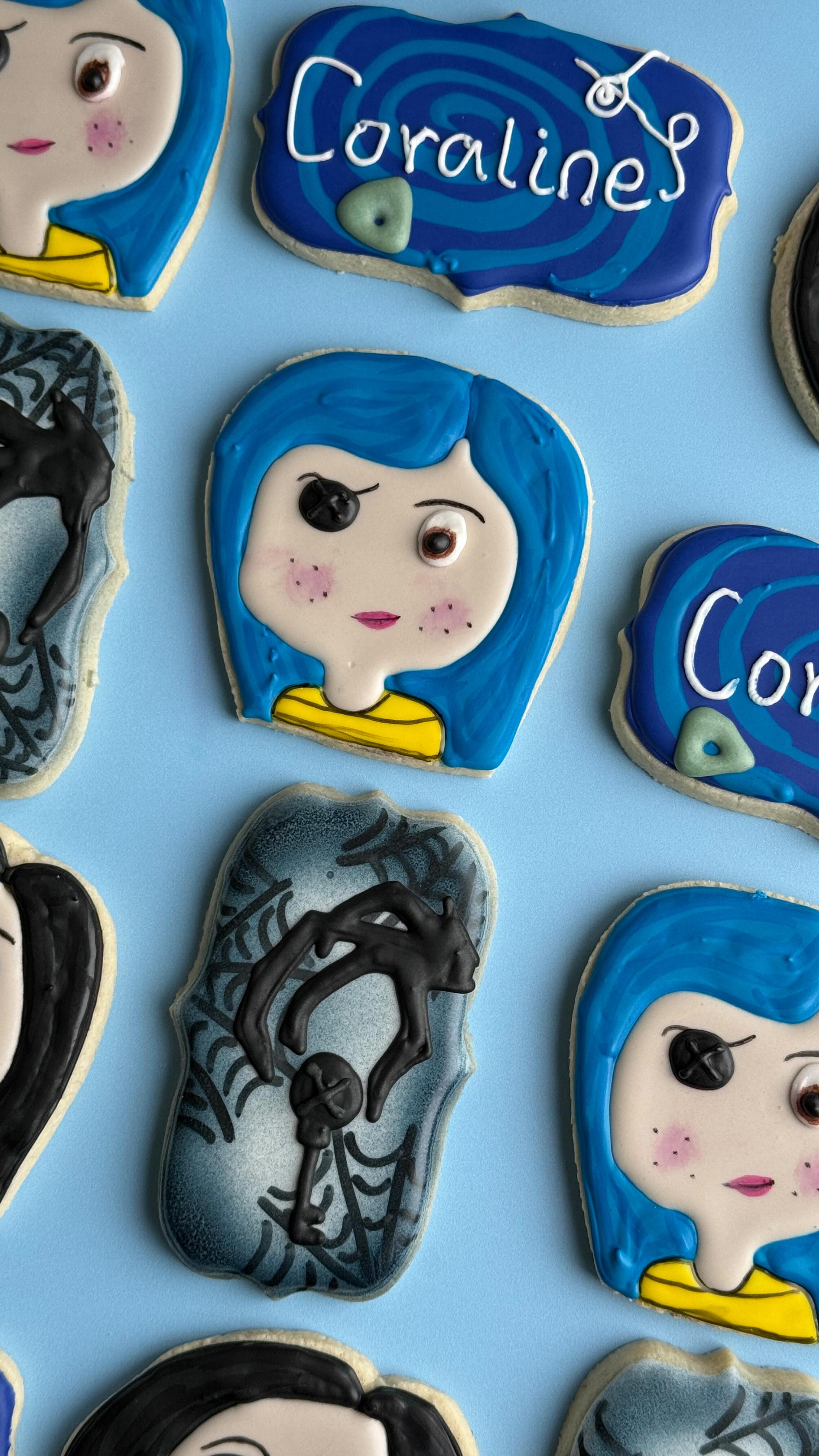 some Coraline cookies from a few weeks ago 🪡🖤
.
.
.
.
.
#customcookies #coralineparty #juliassweettreats #decoratedsugarcookie #royalicingart
