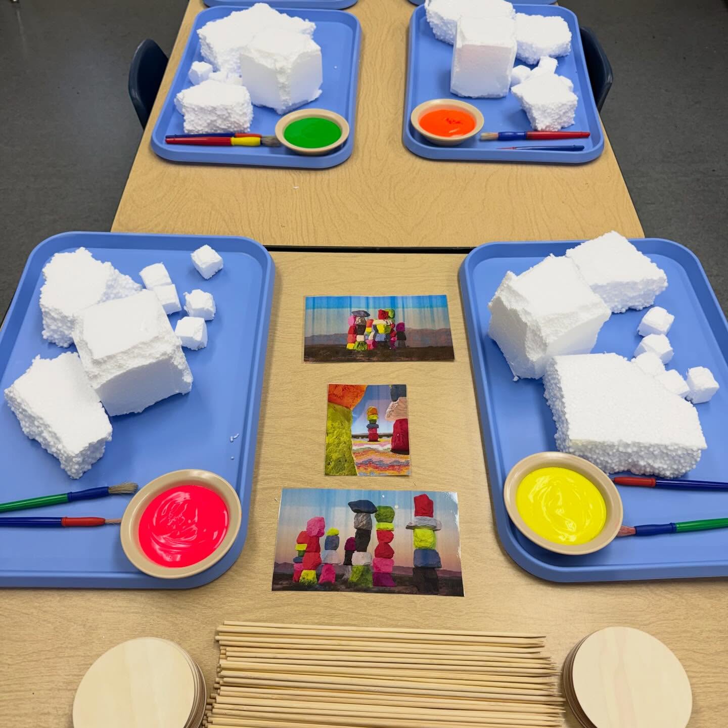 Invitation to Create the Seven Magic Mountains// #SevenMagicMountains is a colorful outdoor art installation created by Swiss artist @ugorondinone0. Located in the desert just outside Las Vegas, the artwork features seven tall towers made from large stacked boulders painted in bright neon colors. Rondinone created the installation in 2016 to bring a burst of color and creativity to the desert landscape and to explore the connection between nature and human imagination. The vibrant rocks stand out against the natural desert scenery, making the piece both playful and magical.
We invited the children to paint recycled styrofoam packaging that we broke down into boulder-like shapes. We provided @colorationsart fluorescent paint and brushes from @discountschoolsupply and invited them to paint freely all over the pieces, experimenting with bright colors and bold brushstrokes. After drying, they pushed the boulders through a kabob stick to stack them and make towers.
Introducing children to different types of art and artists helps expand their creativity and curiosity about the world around them. Projects inspired by works like Seven Magic Mountains encourage children to explore color, texture, and form while strengthening fine motor skills through painting and handling materials. It also helps children see that art can exist everywhere, not just on paper, but in nature, large spaces, and unexpected places. Learning about artists like Ugo Rondinone allows children to connect their own creations to the wider world of art, helping them understand that their ideas, imagination, and self-expression are valuable and worth sharing. #tinkerwonderplay #preschoolart #arteducationmatters #letthempaint