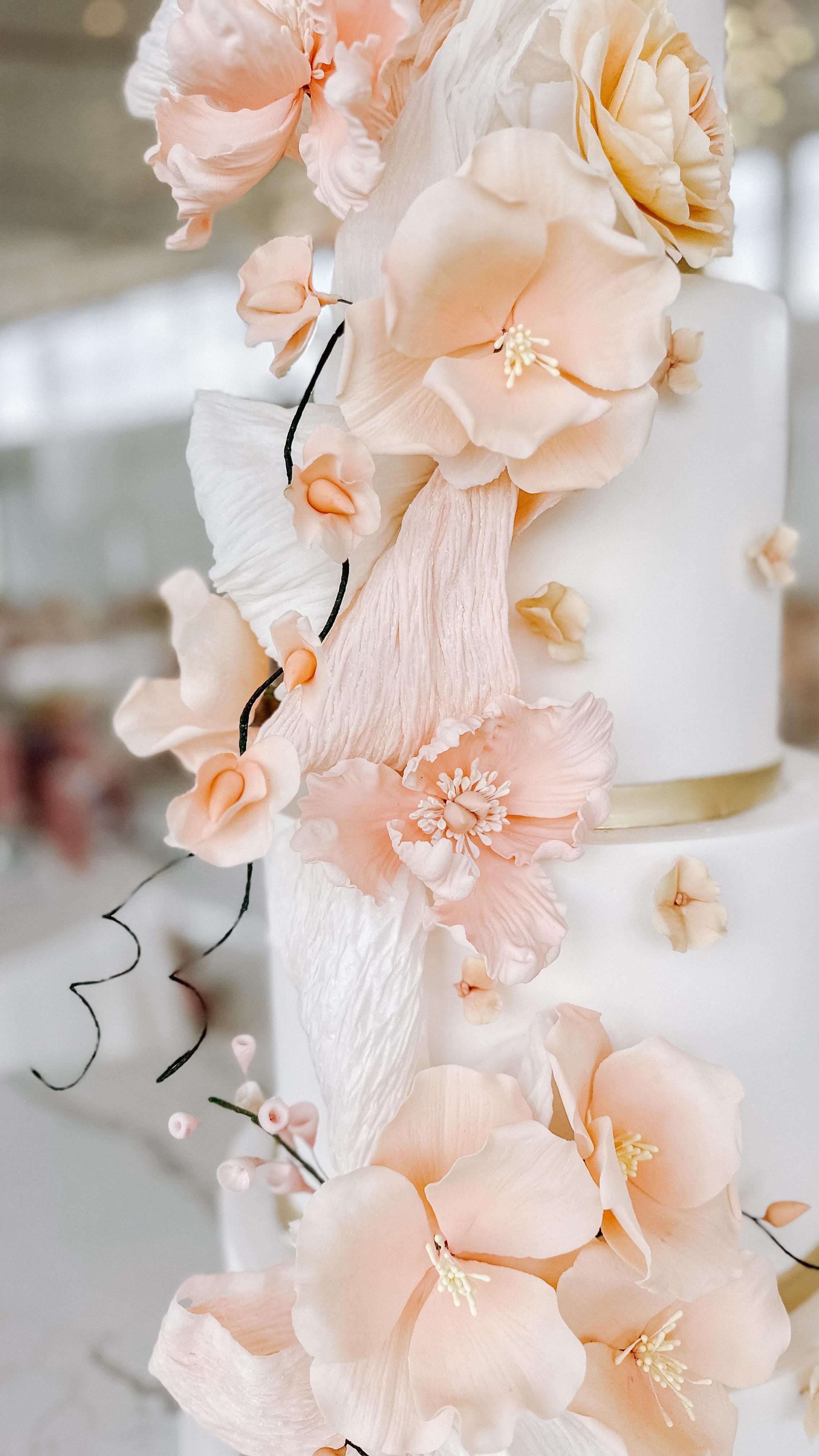 Handmade sugar flowers, a little romance in the air, and a cake made for a love story… 🌸
There’s just something about delicate florals and soft music that makes wedding cakes feel extra magical — like they belong in a scene straight out of a period romance.
Set within the most breathtaking venue and surrounded by the most beautifully curated details by an incredible events team, our cake found its perfect place among the magic. Every element felt so effortlessly elegant, like it was always meant to be there.
Crafted petal by petal for the sweetest “I do.” 🤍
#WeddingCake #SugarFlowerCake #LuxuryWeddingCake #BridgertonVibes #ElegantWeddings WeddingInspiration CakeDesigner HandmadeSugarFlowers RomanticWeddings WeddingDetails