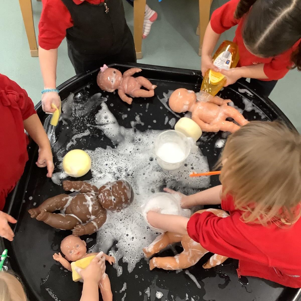 A great activity for developing personal, social and emotional skills, as well as some general splashy fun… it was bath time at preschool.
Washing, splashing and perhaps a tad enthusiastic with the bubbles…all in the interest of doing an exceptional job and making sure the babies were sparkly clean.