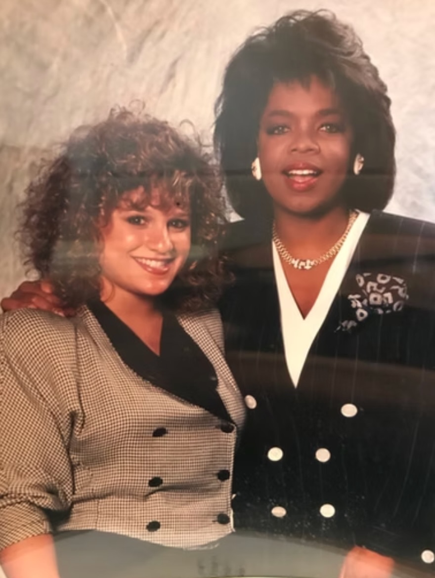 There was a time I decided I was going to interview Oprah.
Not “maybe.” Not “if the publicist says yes.” Not “when I’m bigger.”
I went on air and said: I’ll give $5,000 to anyone who gets Oprah on this show.
Chaos.
A few days later, a VP from HARPO called. “I don’t know who you are or what you’re doing, but Oprah will not call out someone’s name for money.”
Fair.
So I pivoted. $5,000 to the charity of Oprah’s choice.
Still no.
The next day? I doubled it. $10,000.
My GM lost his mind. The VP called back.
And suddenly… we were flying to Chicago.
We brought two listeners with us, after running a contest: “In 105 words or less, why should YOU meet Oprah?”
Hundreds of entries. Boxes everywhere. Two interns. Endless reading.
We narrowed it down to two.
We spent the day at The Oprah Show. We ate at her restaurant. We made magic happen.
Here’s what that moment taught me:
You don’t wait to be chosen. You create the moment. You take the swing. You risk looking ridiculous.
Sometimes reinvention looks like courage. Sometimes it looks like doubling down when everyone thinks you’re crazy.
Either way… it moves the needle.
#LifeTakeTwo #MindyBaer #MidlifeReinvention #WomenWhoDare