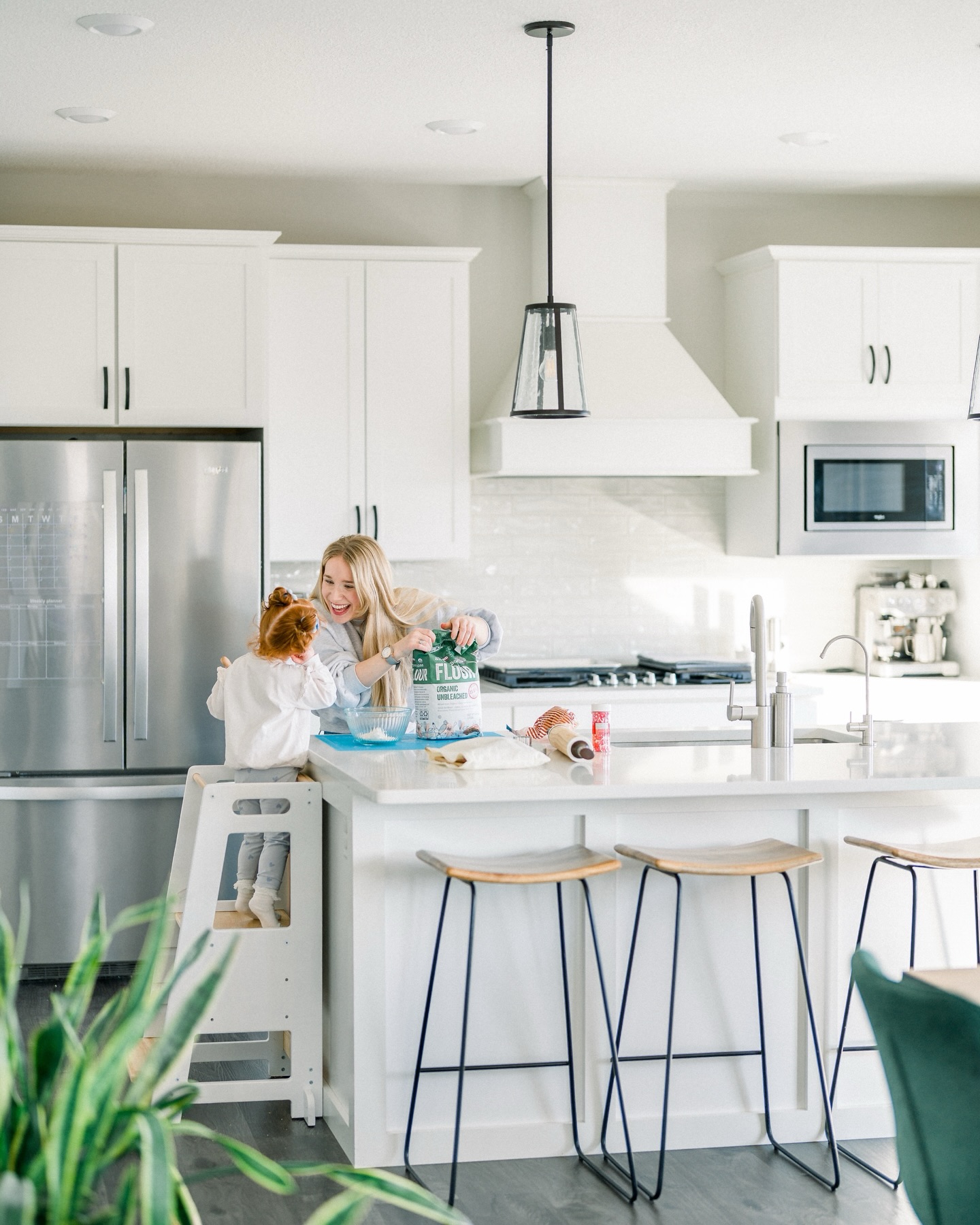 Motherhood lives in the little moments.
Rolling dough together.
Lifting tiny bodies up to the counter.
Tiny hands helping… even if it gets a little messy.
The flour will get cleaned up, but the memories made in moments like this last forever.
If you’ve ever wished you could freeze these everyday moments in time, I would love to help you do just that. Whether it’s baking in your kitchen, playing in the backyard, or something completely unique to your family, we can dream up something beautiful together.