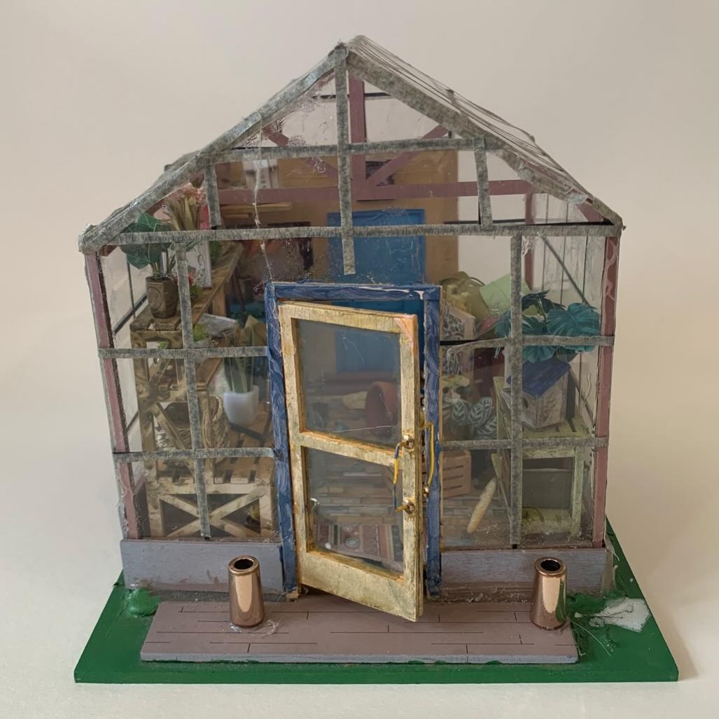 The Artist Wall is adorned this month by the intricate work of @jennyjanesamuels …it is extraordinary . If you are passing by look very closely! #minitures #greenhouses #hernebay #theartistwall