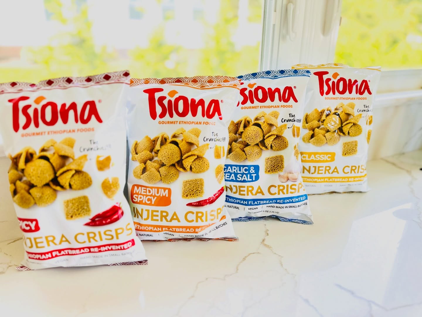 Indulge in the tangy flavors of our injera, a traditional Ethiopian flatbread, perfect for scooping up mouthfuls of deliciousness. Dive into our fragrant vegetable stews, bursting with the goodness of tomatoes, onions, and aromatic herbs. And don’t forget to try our savory lentil and split pea dishes, packed with protein and wholesome goodness.
Shop: www.tsionafoods.com
#tsionafoods #tsionafoodsproducts #tsionafoodscrisps #injerachips #injera injeracrisps ethiopiansaltysnack saltysnack tsionafoodschips