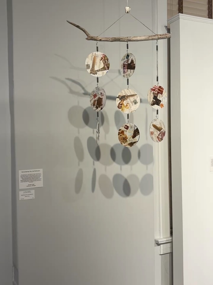 Remembering You: Self Reflection was juried into the “Cut, Paste, Create” show at @lacaarts in Ludington. I’m thrilled with how they displayed it in the gallery so viewers can walk around the piece. This is what I wrote about it:
“I’ve been thinking about my own mortality since my mom died in May 2022. How can I live my days with more intention? How will people remember me when I’m gone? How will future generations reminisce about the past without printed photographs? Vintage photos and postage stamps left behind by distant relatives are collaged on background papers rescued from my mom’s art studio. Discarded CDs and spring connectors provide a framework. Sunbursts on the back sides allow viewers to self-reflect and see themselves in the narrative.”
#collage #collageart #jengatz #collageexhibition #artexhibit