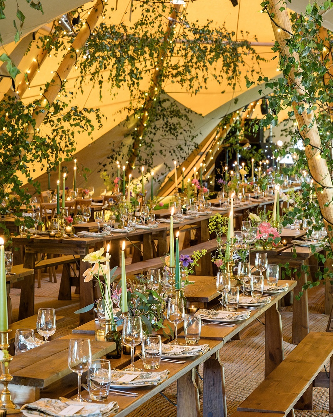 NOT A MAGICAL FOREST GLADE WEDDING. Why is that? Because a “magic forest glade” indicates delicate fairies and whimsical fancy. And Emily (and Isaac) are none of those things. Nope. Emily is sturdy boots and glorious mane of hair pulled back in a messy bun, strong shoulders, clever brain and a backbone of steel. She’s full time Warrior Queen, part time alien hunter, rather than airy-fairy ditzy Fairy Princess. So what you’re actually seeing here is intentional, authentic - Tom Stuart-Smith style - organic English summer. All beautifully seasonal, thoughtfully crafted, built and delivered with a good dose of strength and masses of heaps of kindness. All Emily. Warrior Queen.
Photographer: @sarahvivienne
Bouquets & local flowers: @flowerandfarmer
Clever green fingers: friends of Emily’s and @tomstuartsmithstudio
Tipi: @teepeesandtents
Decor hire: @nerissaeveweddings
Napkins & candles: @theluxecollectionuk
Caterer: @sarahsarahcooks
Production: @rjcceventsltd
Additional furniture: @moreproductionuk
DJ: @dj_gentlemangeorge
Aliens: @1saac_films
#weddingplannernorthamptonshire #tipiwedding #weddingtipidecor #tipiweddinginspiration #outsidewedding #gardenwedding #woodlandwedding
#tipitables