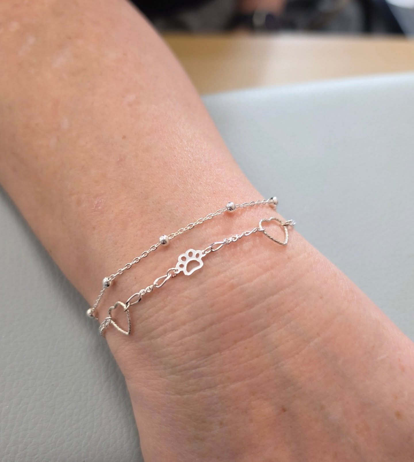 Helena chose to create the sweetest little stack today ✨
Two sterling silver chains layered together, our satellite and figaro.
Finished with delicate heart and paw charms for that extra personal touch 🐾🤍
Permanent jewellery is all about creating pieces that mean something to you… and this one is full of love.
📲 Tap the link in our bio to book your appointment!
#permanentjewellery #weldedbracelet #Staffordshire #stokeontrent