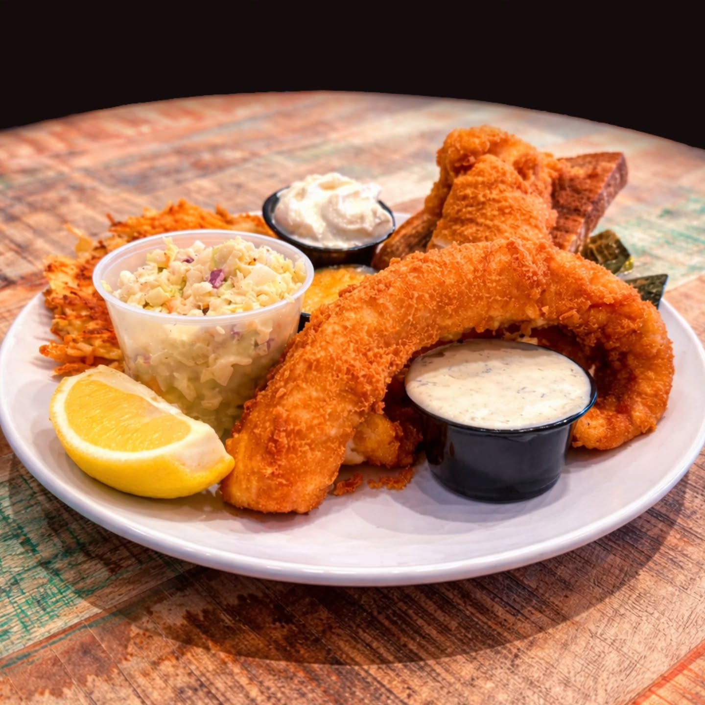 FISH FRY FRIDAY BACK TOMORROW!!!
Sconnie Style Walleye Fry
Light & Crispy Beer Battered Fresh Walleye, 2 Homemade Cheesy Potato Pancakes with Sour Cream and Apple Sauce, Zesty Coleslaw, House Tartar Sauce with your choice of Hawaiian Rolls or Thick Cut Marbled Rye, Butter and Lemon.
Dine-In Only!