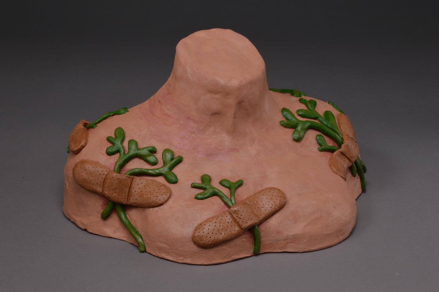 I keep forgetting to post this one from last semester! One of my favorites for sure🌱
“Healing”
Acrylic Paint on Ceramic
This almost life size bust is a personal narrative of healing. My skin has gone through a journey of pain and healing and I wanted to highlight the effort I have put in to heal myself.