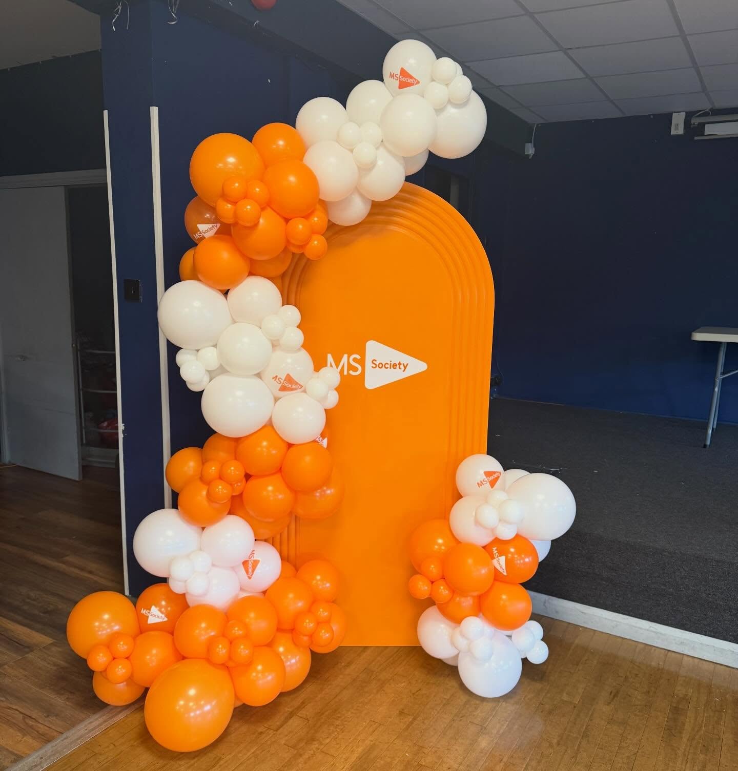 Balloon arch for the mama tasty ms society night tonight 🧡🤍