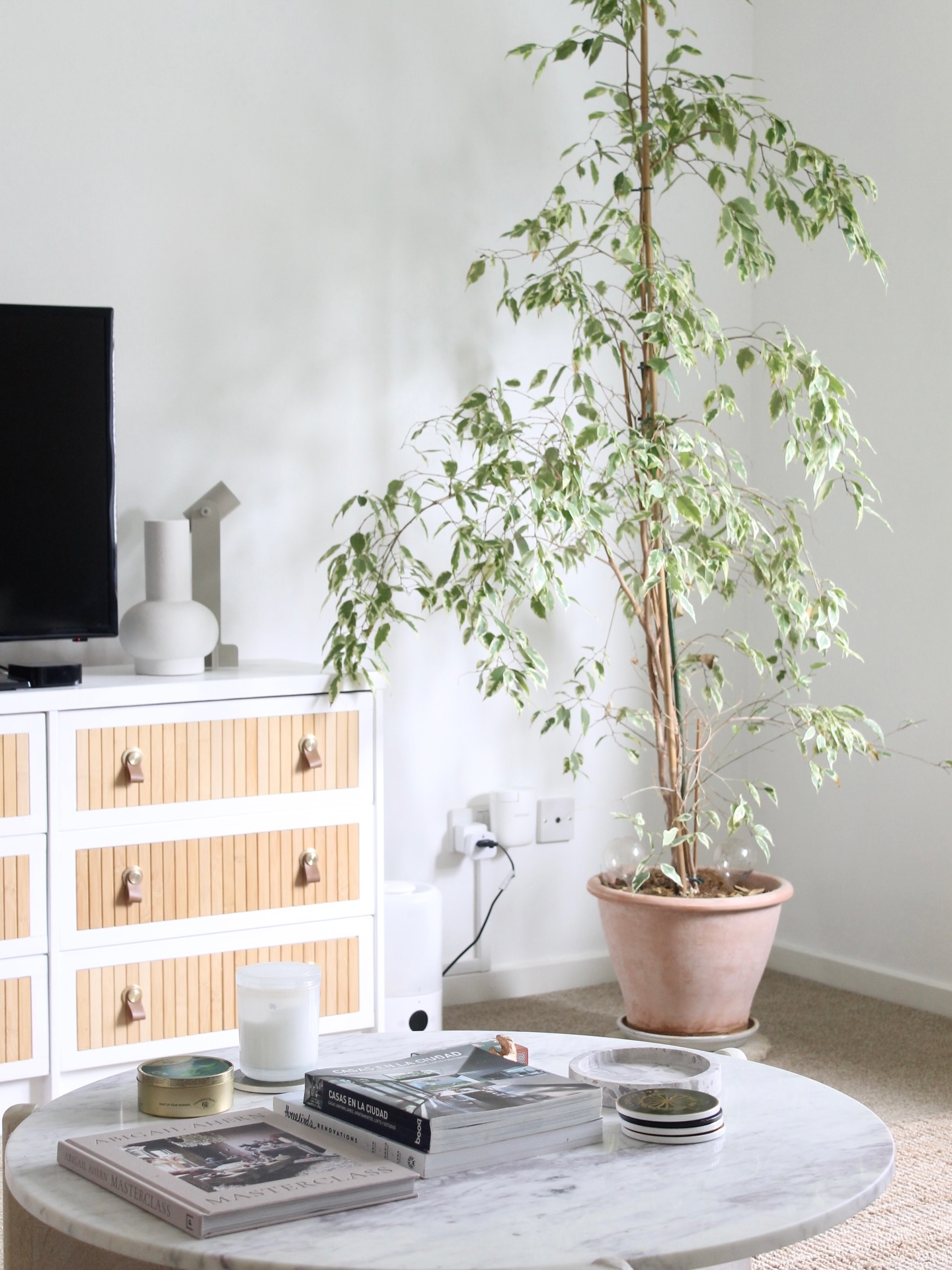 Sharing a few little corners from our home today. Something I rarely do because I’m strangely shy about posting our own space, even though it’s where most of my design ideas quietly start.
These are the spots we actually live in. The coffee table that’s always covered in books and candles, the sofa corner that catches the soft afternoon light, the chair I end up sitting in when I want a quiet moment. Nothing overly styled, just the pieces that make our home feel like ours.
If I had to put a name to the style, it probably sits somewhere between modern organic and warm minimalism. Soft neutrals, natural materials, a few vintage touches, and relaxed layers that make a space feel calm rather than perfect.
And speaking of perfect… our home definitely isn’t there yet. I have a long list of ideas and little projects I want to tackle over time. But I thought I’d share it as it is anyway because real homes evolve slowly.
Trying to share more of this side of things 🤍
#modernorganic #warmminimalism #neutralhome #interiorstyling #livedinspaces
Would you like to see more content like this?
